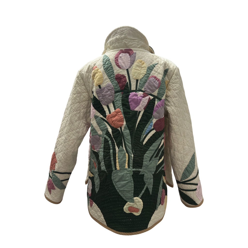 Quilted jacket with floral design on a white background handmade by Fabric & Soul