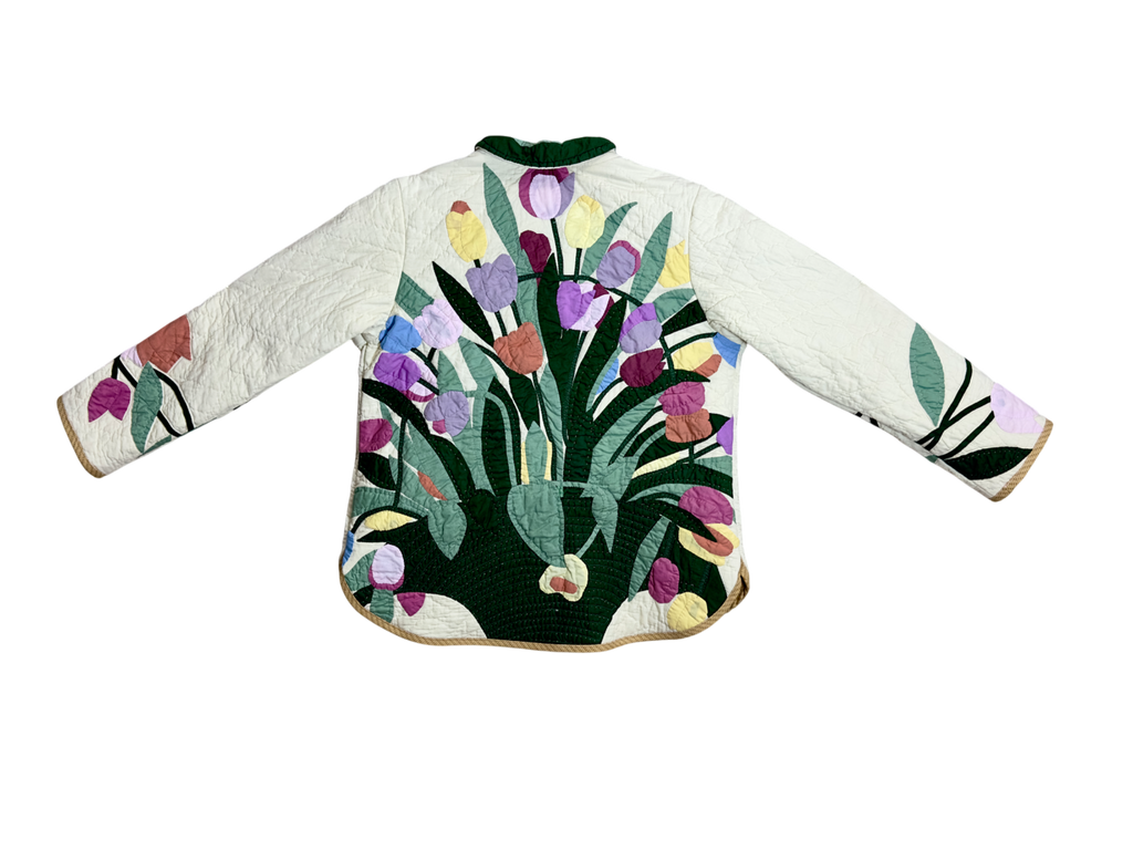 Back of appliqué on custom upcycled, sustainable quilted jacket made by Fabric & Soul.