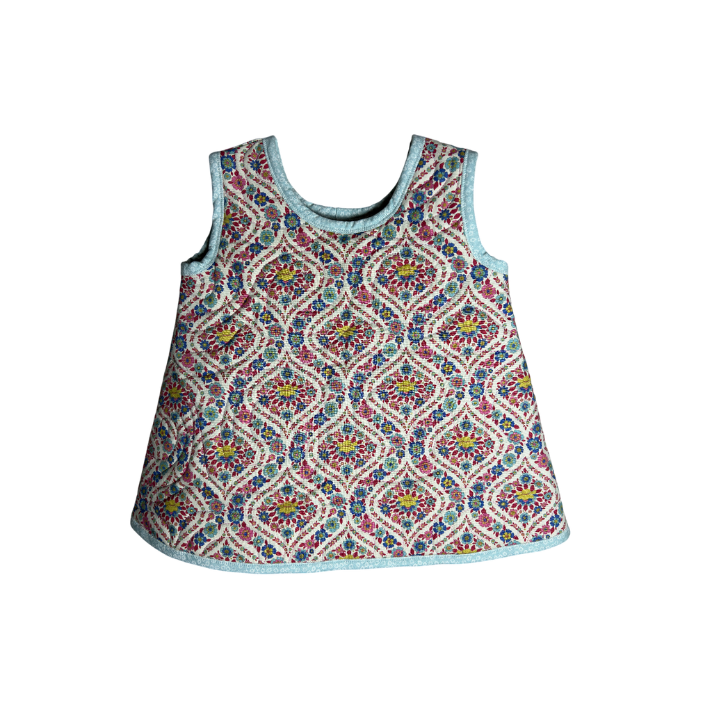 Front of quilted jumper with floral, multicolor design and custom homemade quilting design