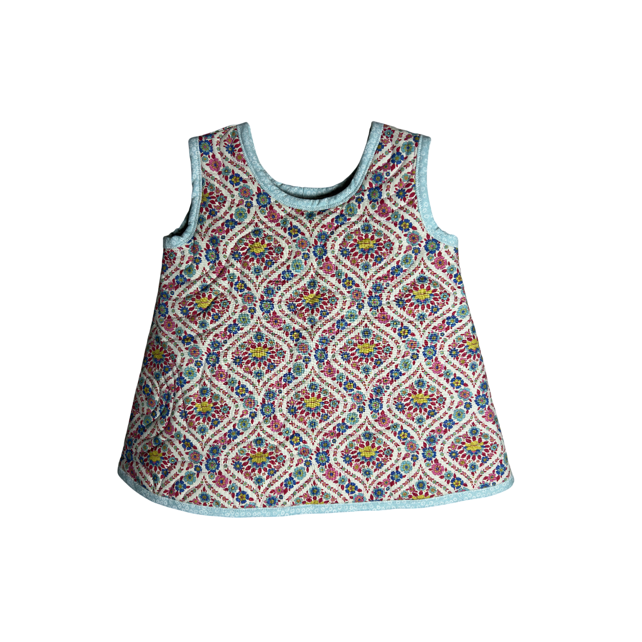 Front of quilted jumper with floral, multicolor design and custom homemade quilting design