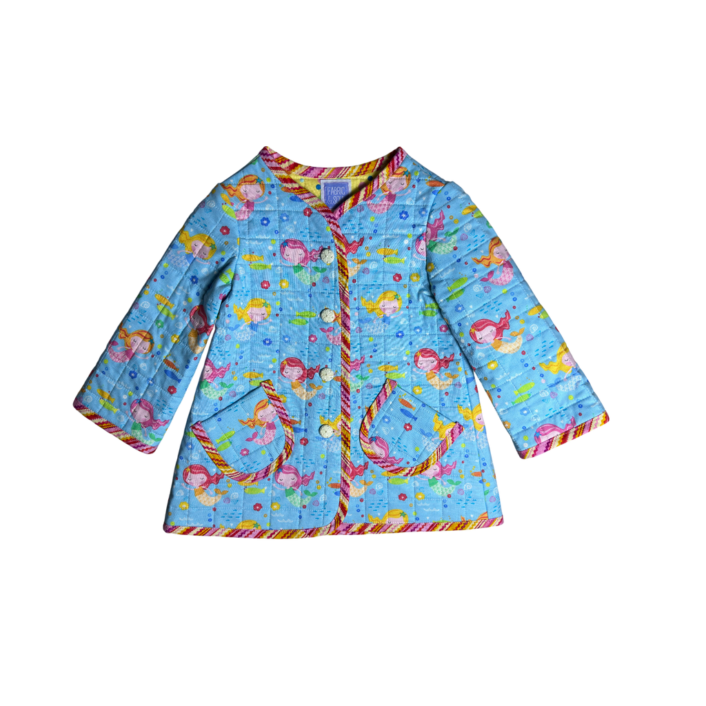 Front view showing zig-zag binding and long sleeves