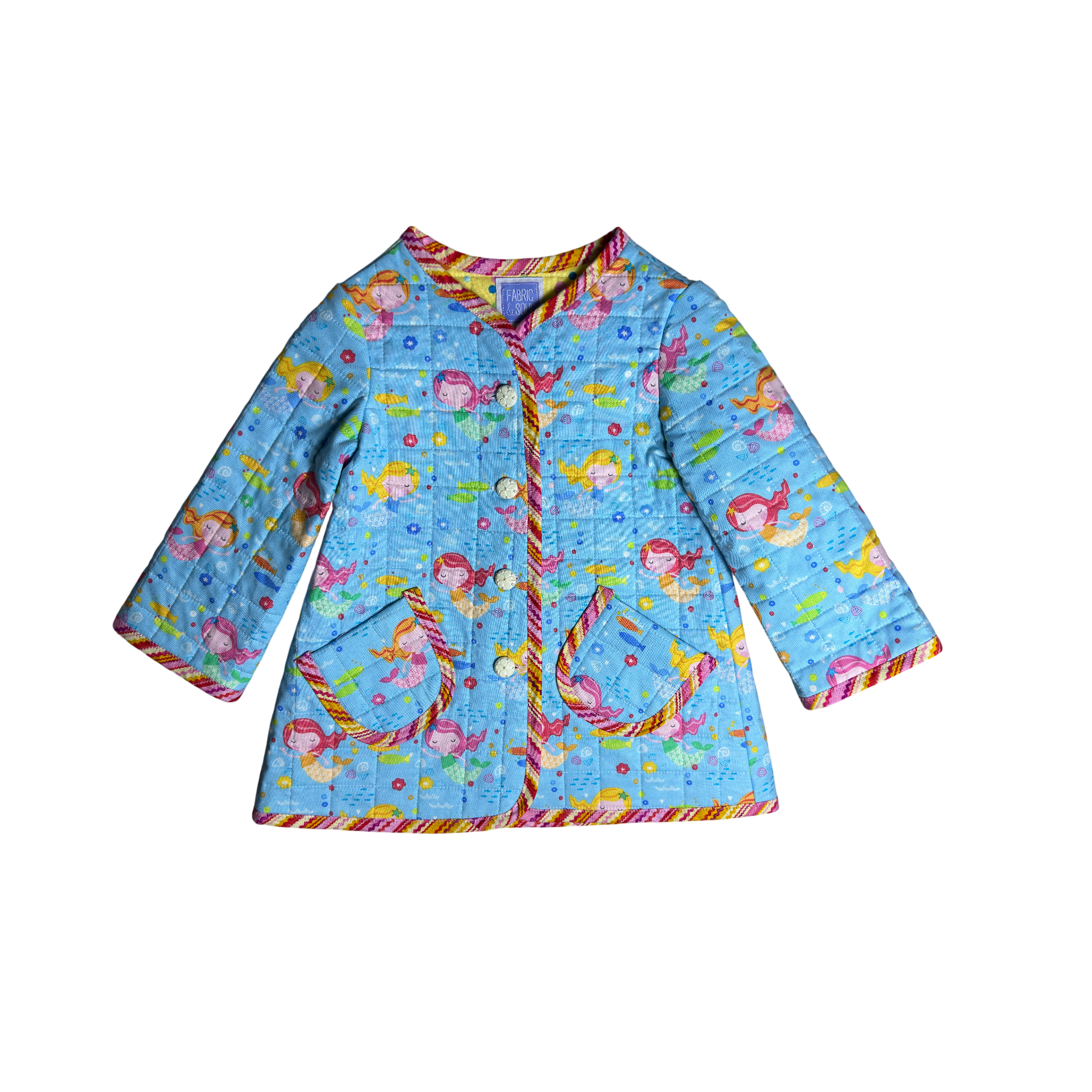 Front view showing zig-zag binding and long sleeves