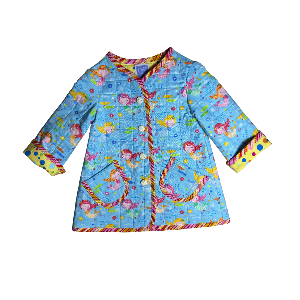 Nautical kids jacket front with pink, yellow, and orange zig-zag binding