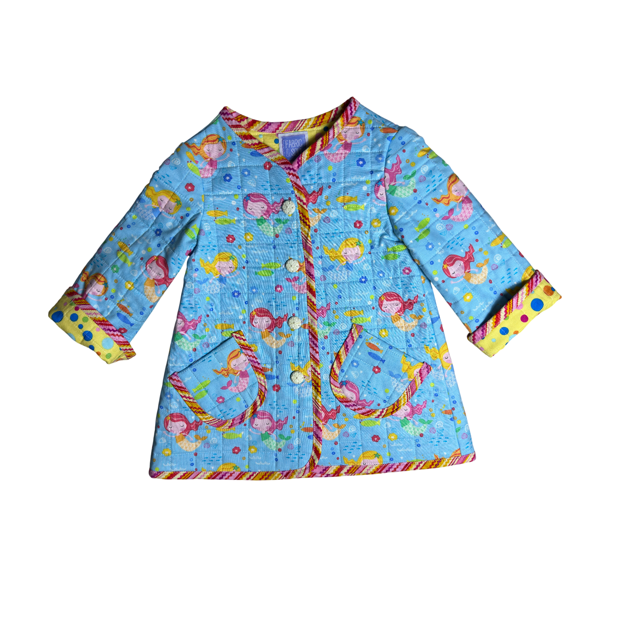 Nautical kids jacket front with pink, yellow, and orange zig-zag binding