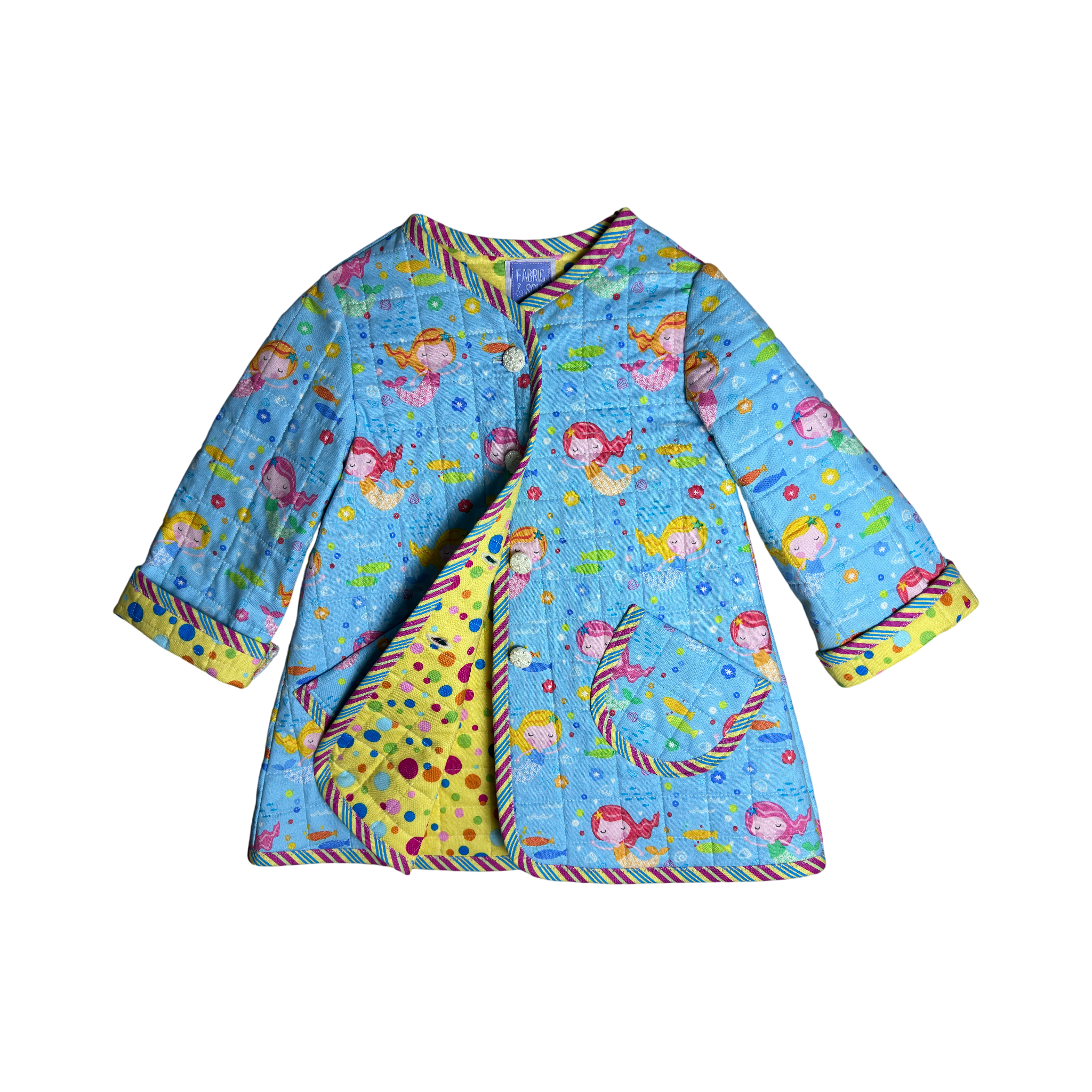 Children's coat showing polka dot lining