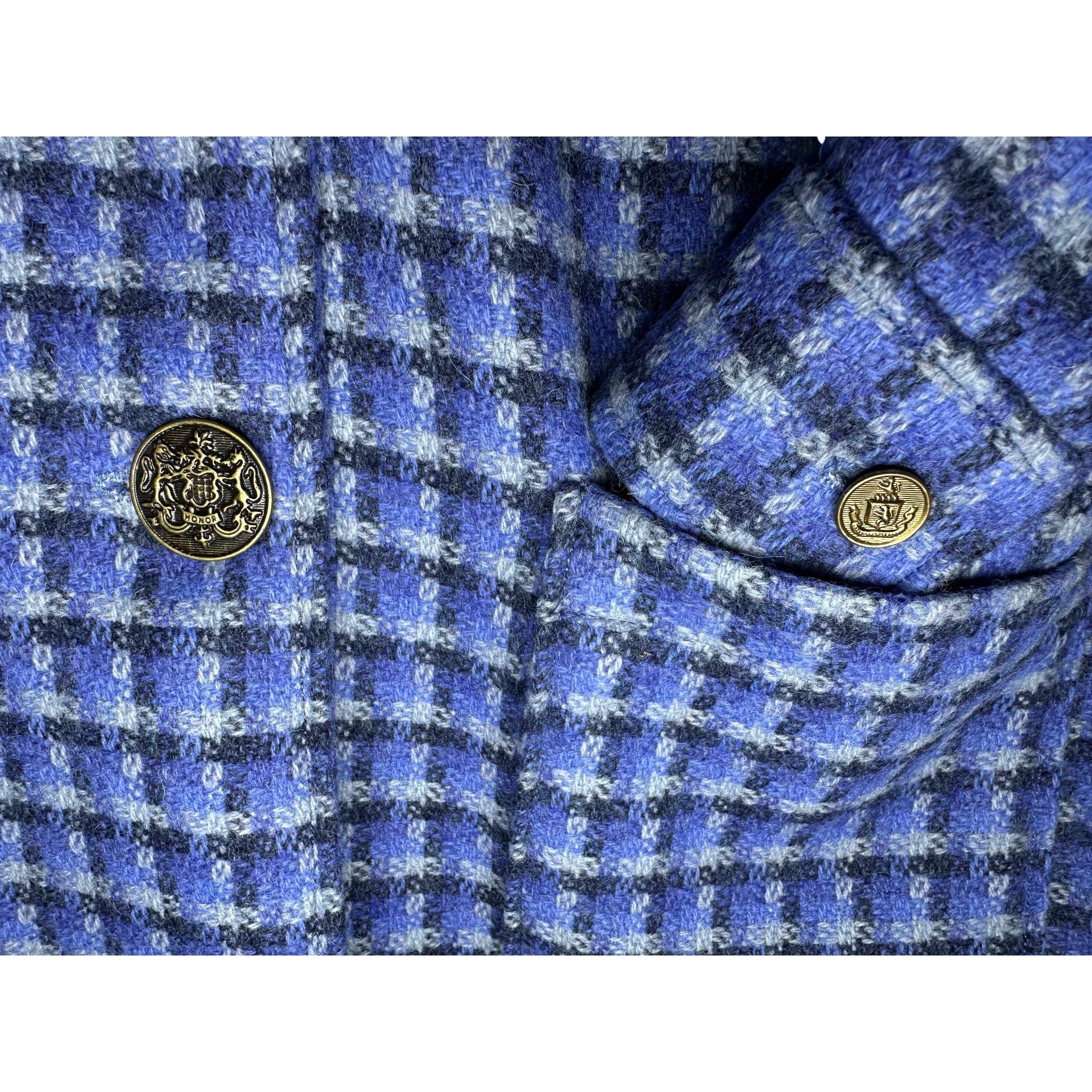Authentic victorian-era livery buttons with complementary brass buttons from early 20th century