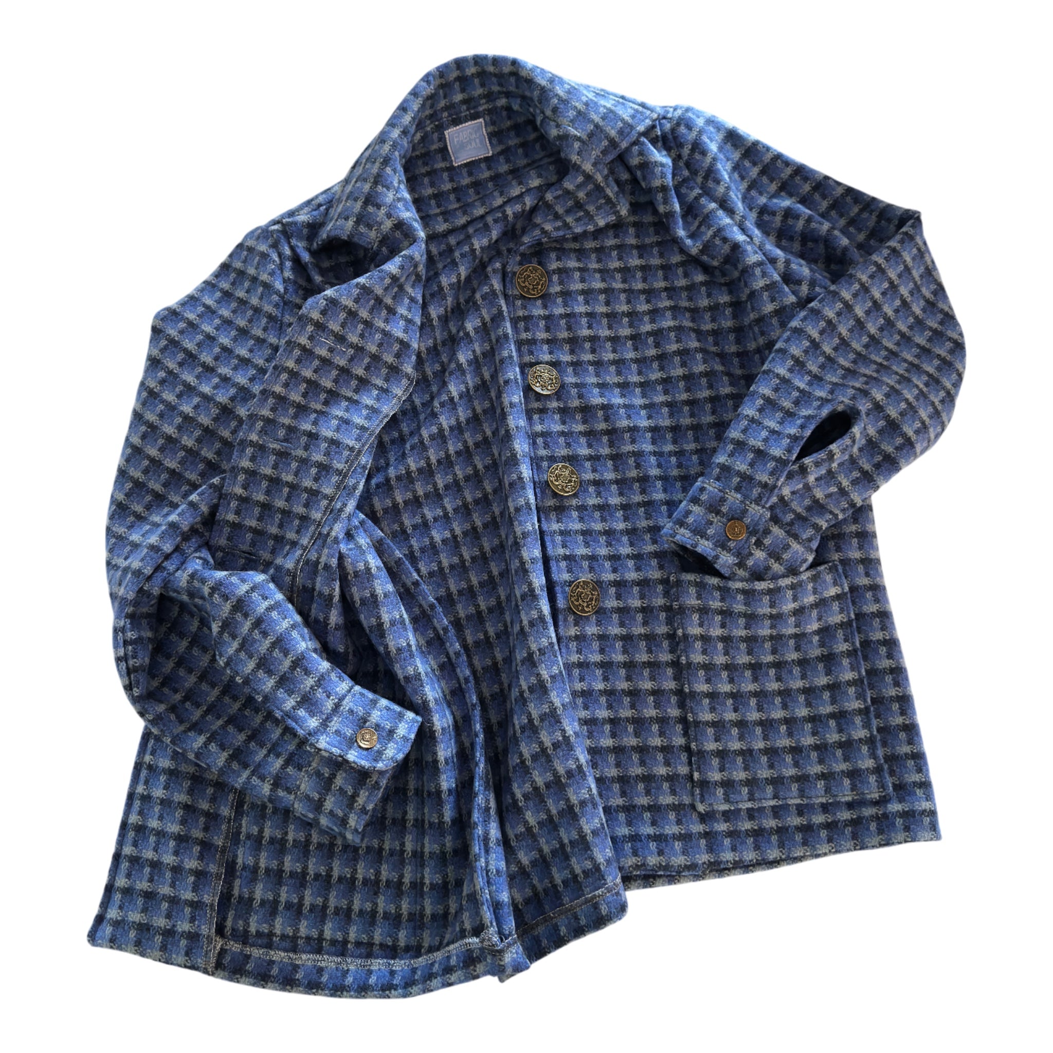 One-of-a-kind women’s jacket made using a 1949 Pendleton pattern, laid flat showing inside seam details