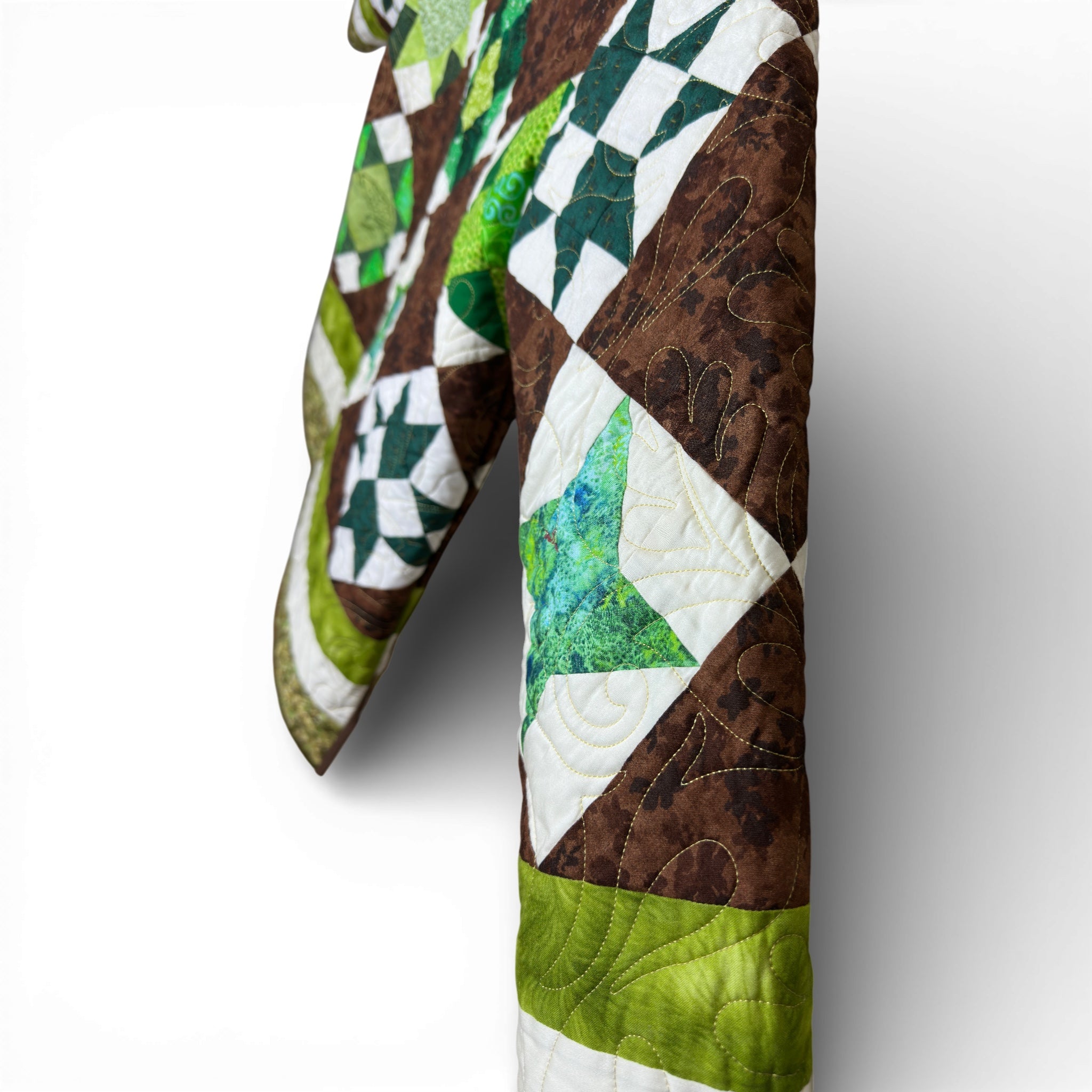 Sleeve quilting detail on one-of-a-kind repurposed quilt coat