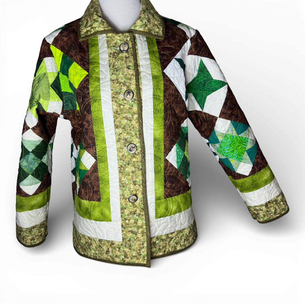 Women's quilted coat on mannequin showing full sleeve length and fit