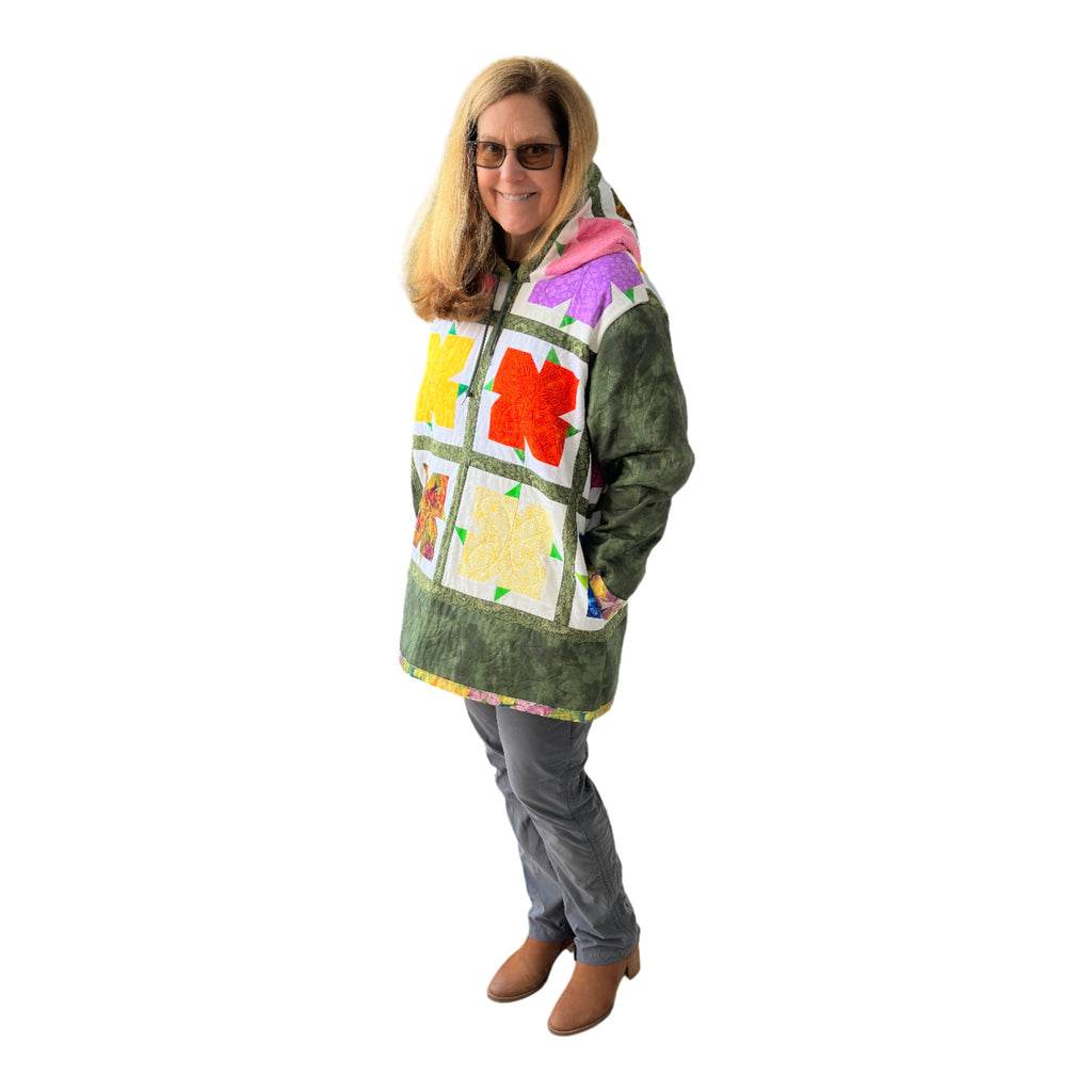 Jacket on 5'6" model showing ample room for layering and tie for hood
