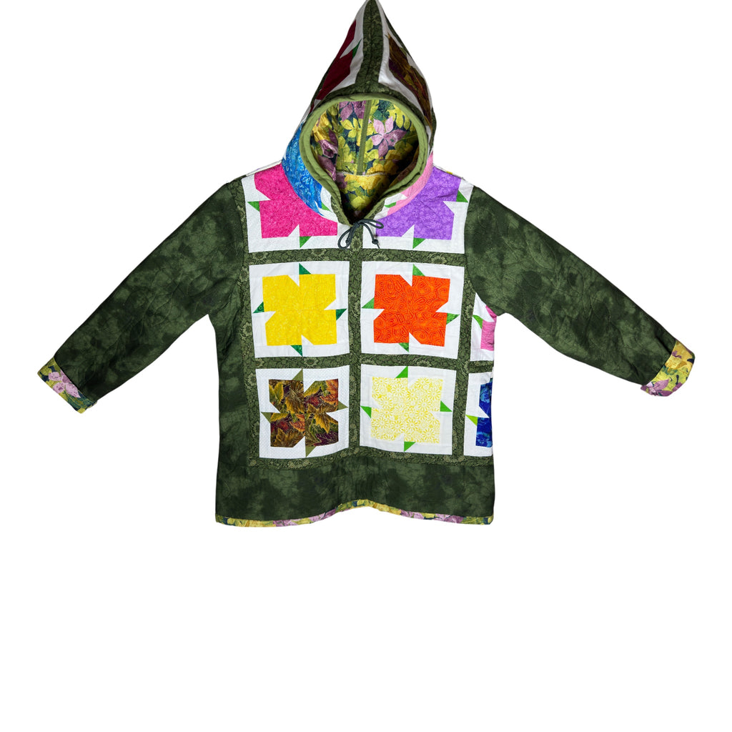 Front view of homemade quilted jacket showing hood detail and quilted design