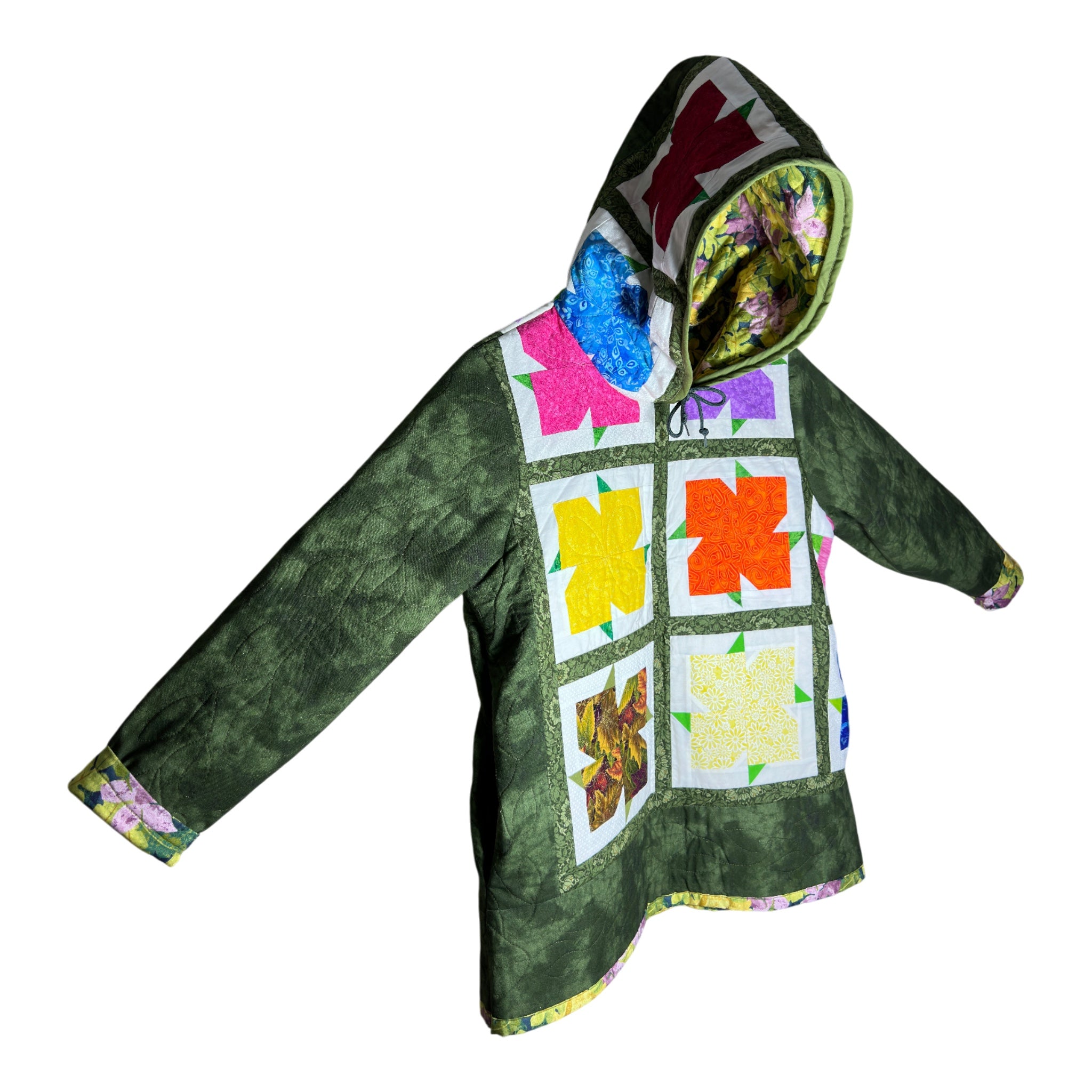 Side of quilted jacket showing quilting detail and hood inside and outside with pocket detail