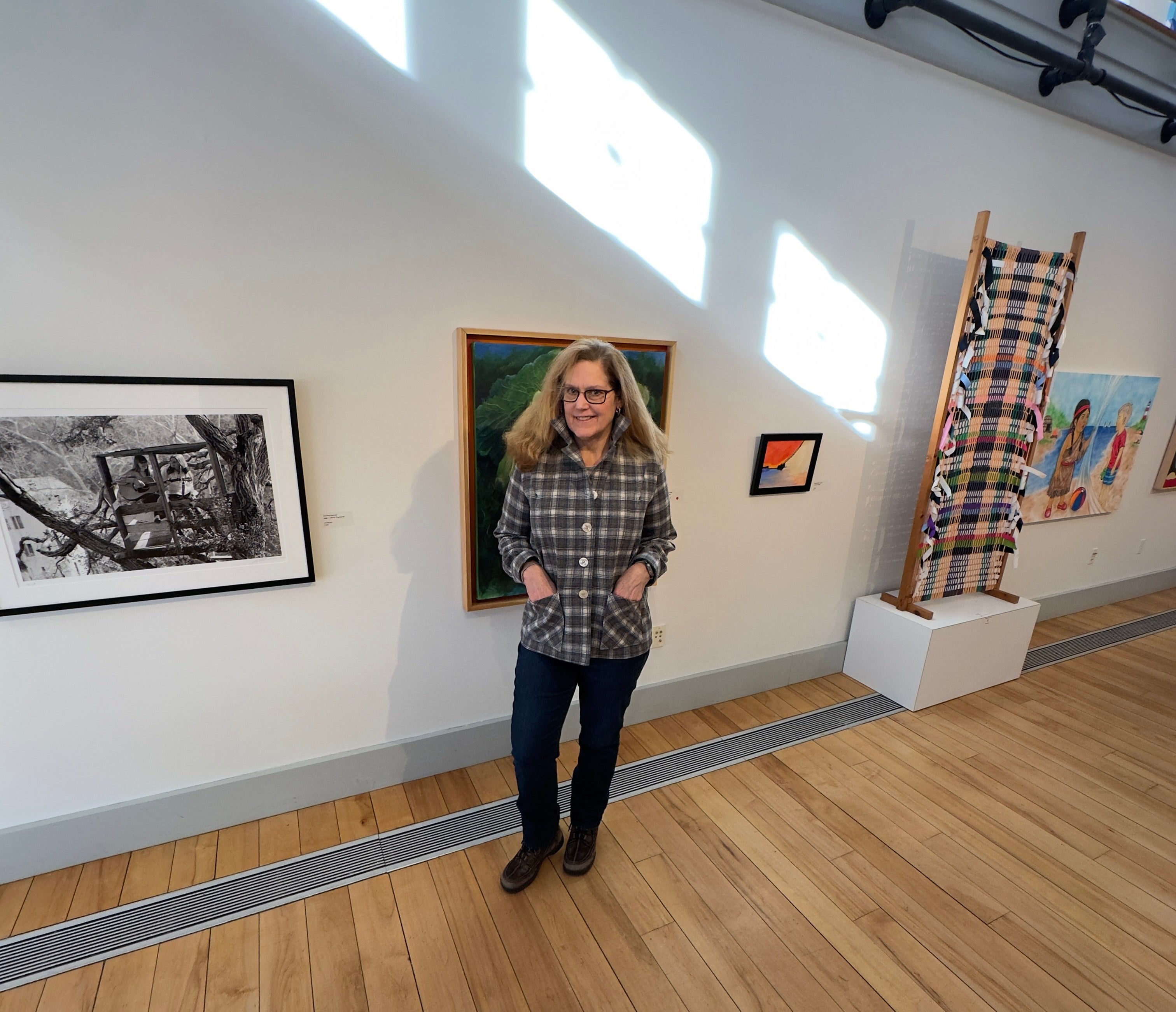 Cotuit Art Center. Handmade wool shirt jacket in tan cream blue plaid - women's medium size showing relaxed fit.