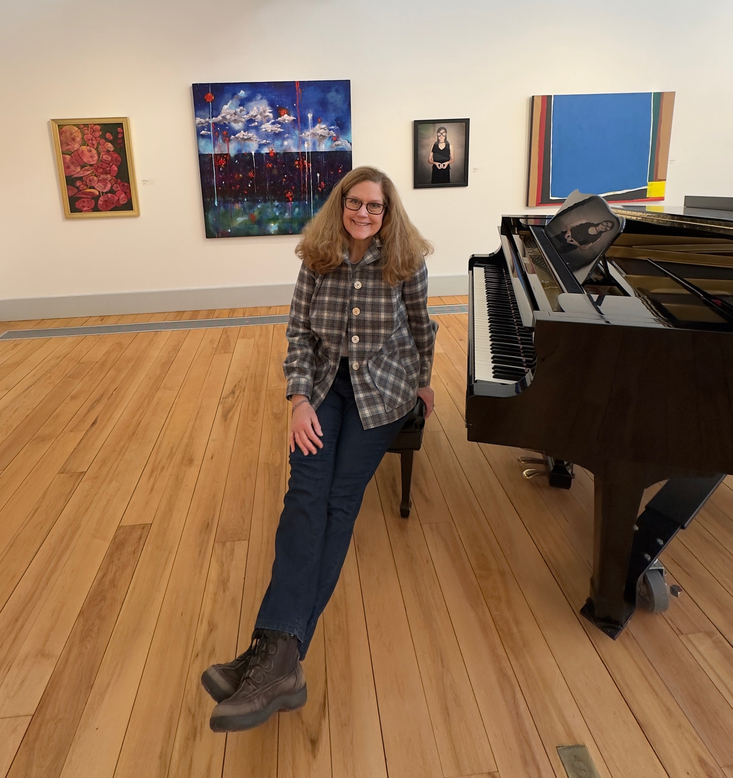 Tan cream and blue plaid wool shirt jacket - front view showing unlined construction and button closure. At Cotuit Art Center.