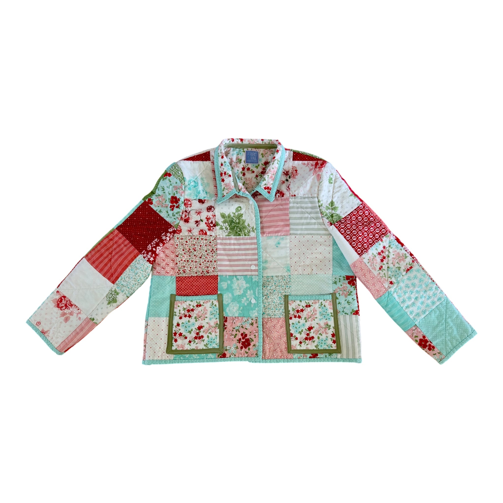 Patchwork quilted jacket made from vintage cotton quilt in red aqua and floral prints with front pockets and white snaps by Fabric & Soul