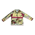 Front view of multicolor floral patchwork handmade, sustainable quilted jacket by Fabric & Soul.