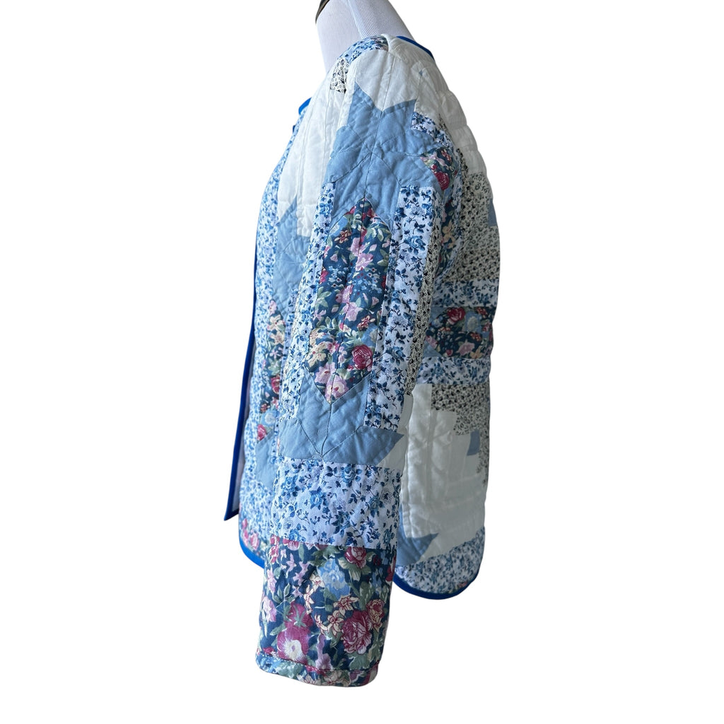 Detail shot quilted fabric texture blue coat artisan outerwear handmade Fabric and Soul Cotuit MA
