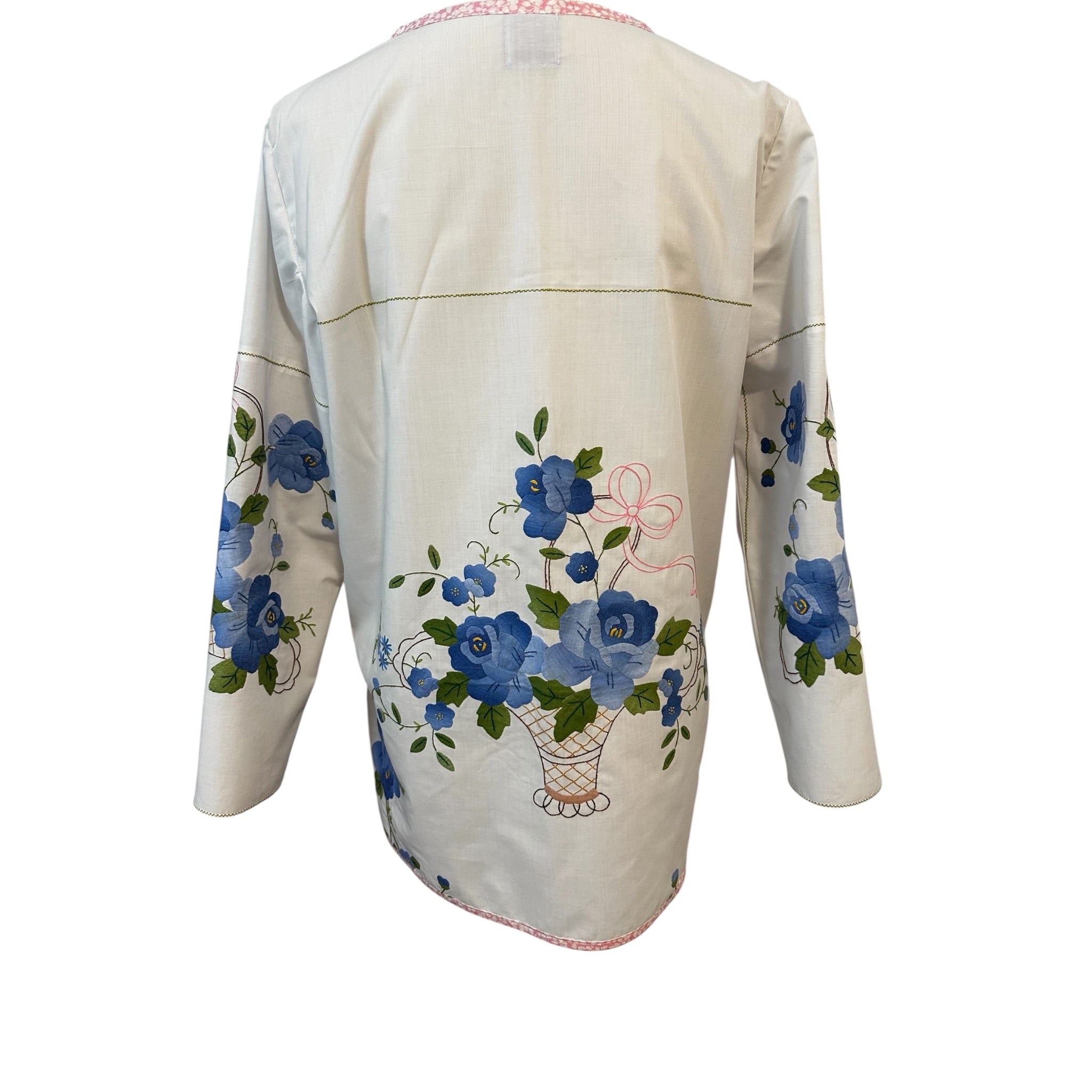 Back view of handmade white cotton tunic with blue floral basket appliqué centered on back — French felled seams, slow fashion by Fabric & Soul
