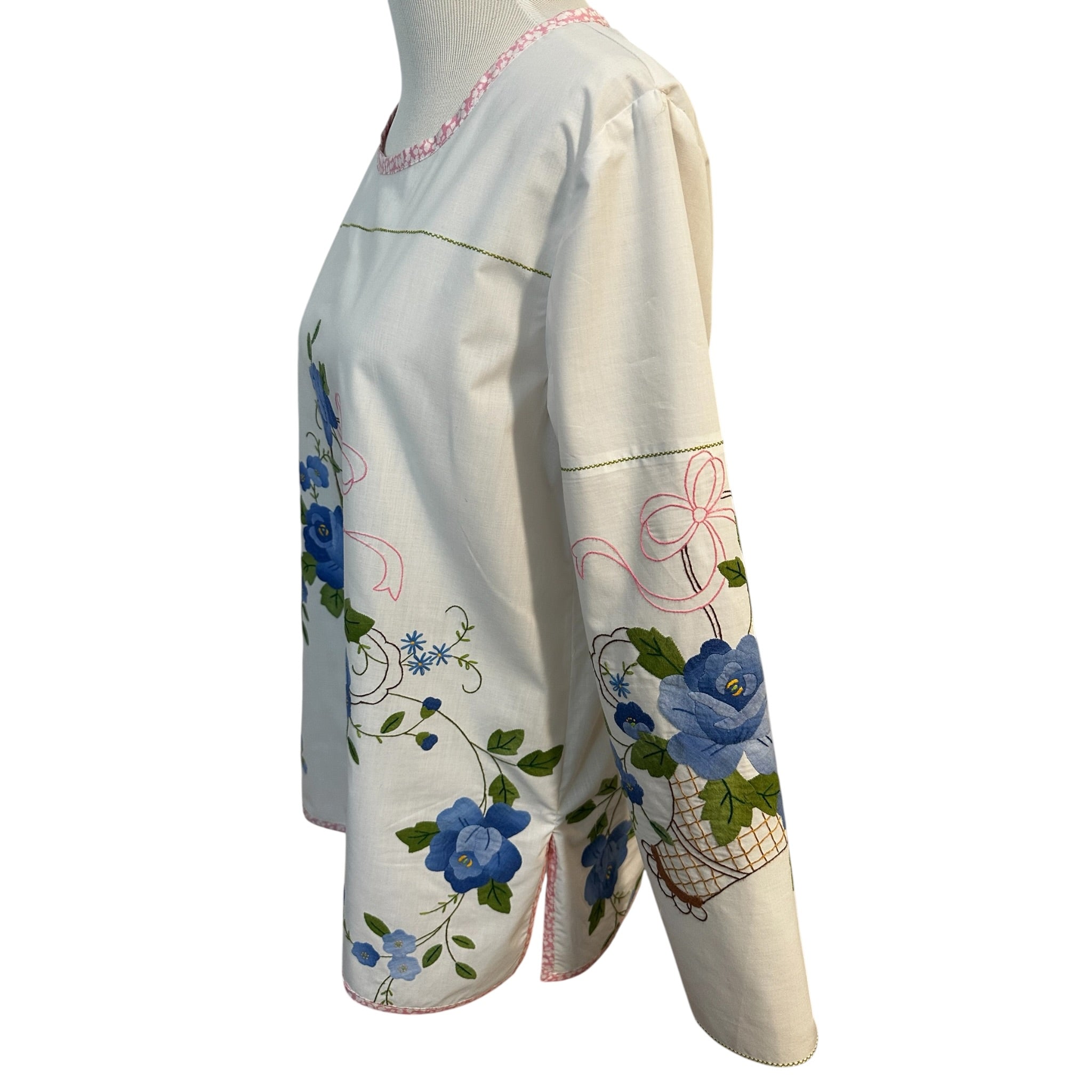 Left side view of vintage blue floral basket tunic showing sleeve appliqué placement and side slit — handcrafted cotton top by Fabric & Soul