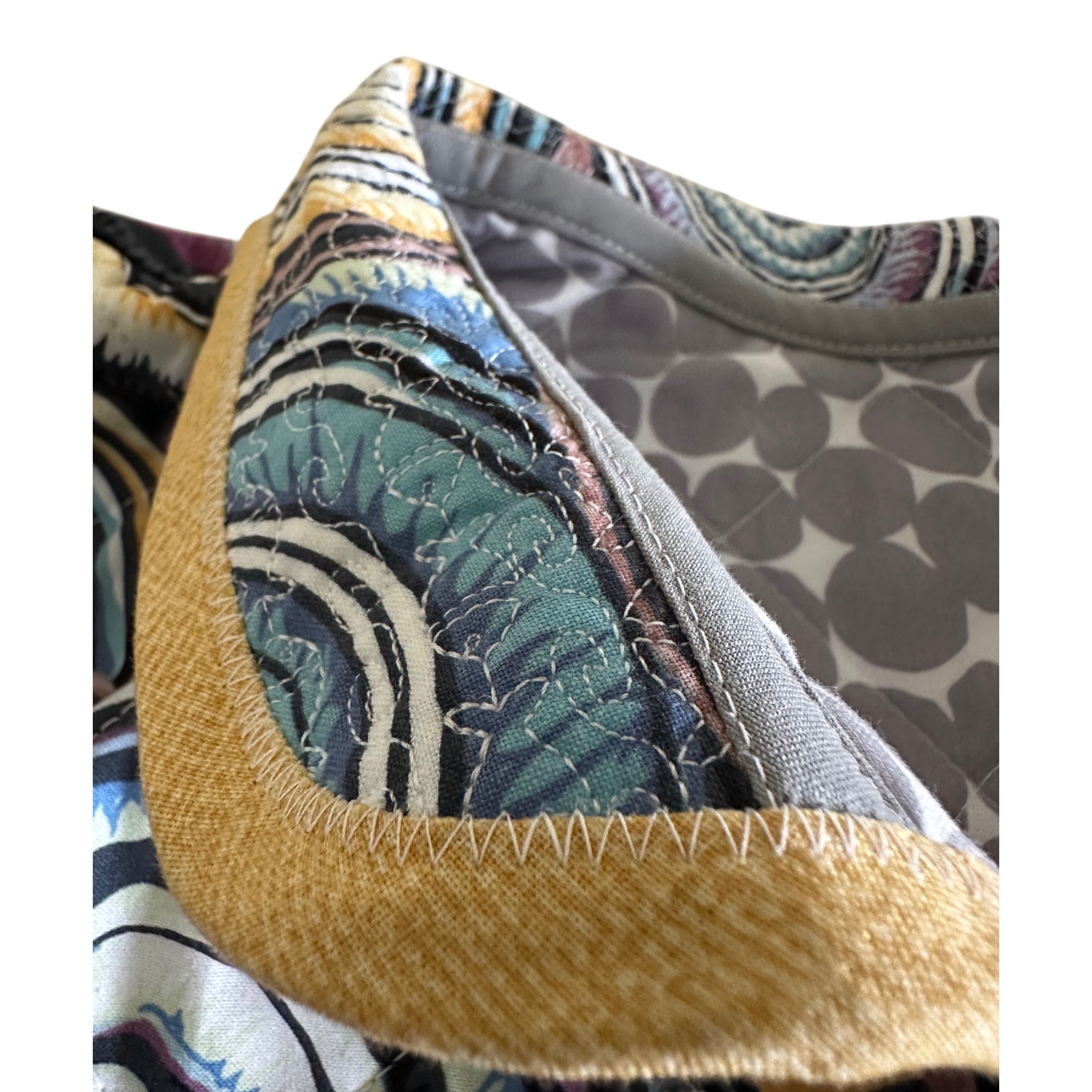 Close up of collar custom stitching on Handmade women's quilted coat in blues, purples gold, relaxed fit Women's Large, Fabric & Soul