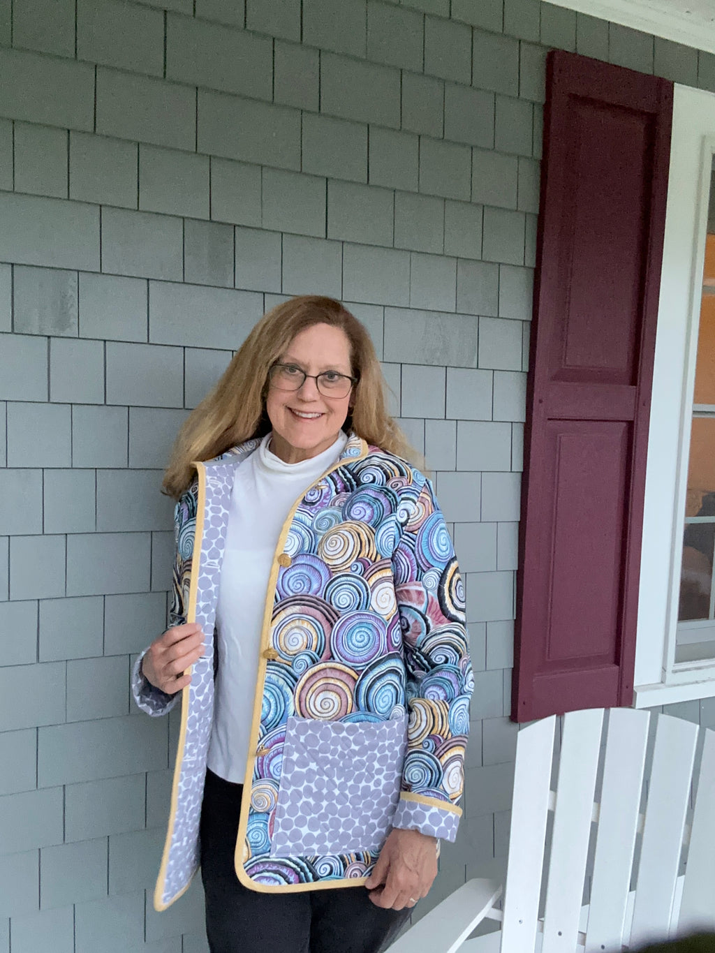 Handmade women's quilted coat open front showing stone-pattern cotton lining and sandy-gold binding, one of a kind wearable art