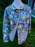 Handmade women's quilted coat open front showing stone-pattern cotton lining and sandy-gold binding, one of a kind wearable art