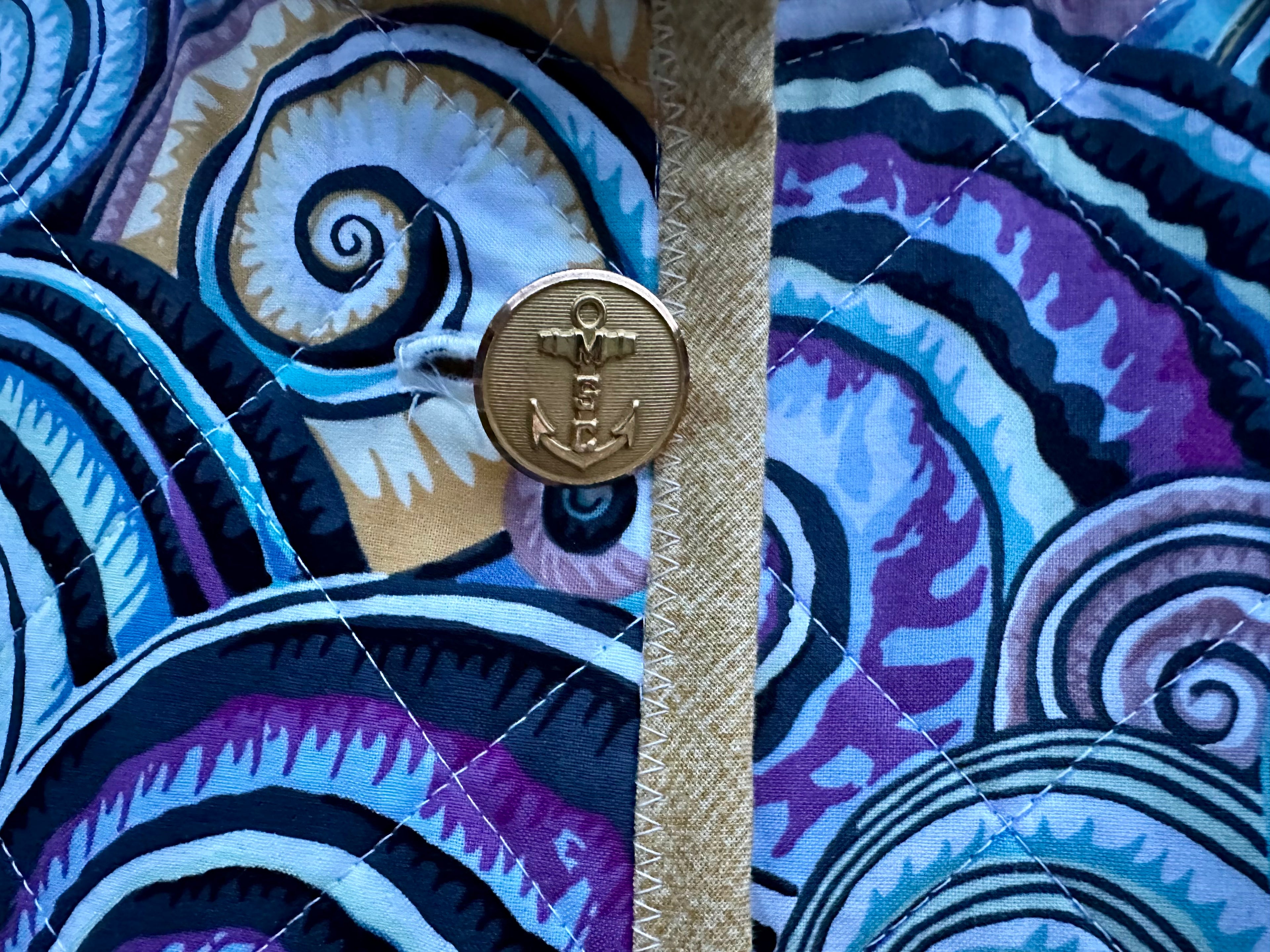 Authentic vintage Waterbury Button Company brass anchor military button, 1970s U.S. Sealift Command, handmade quilted coat detail
Handmade women's quilted coat coastal colors blues purples gold, relaxed fit Women's Large, Fabric & Soul