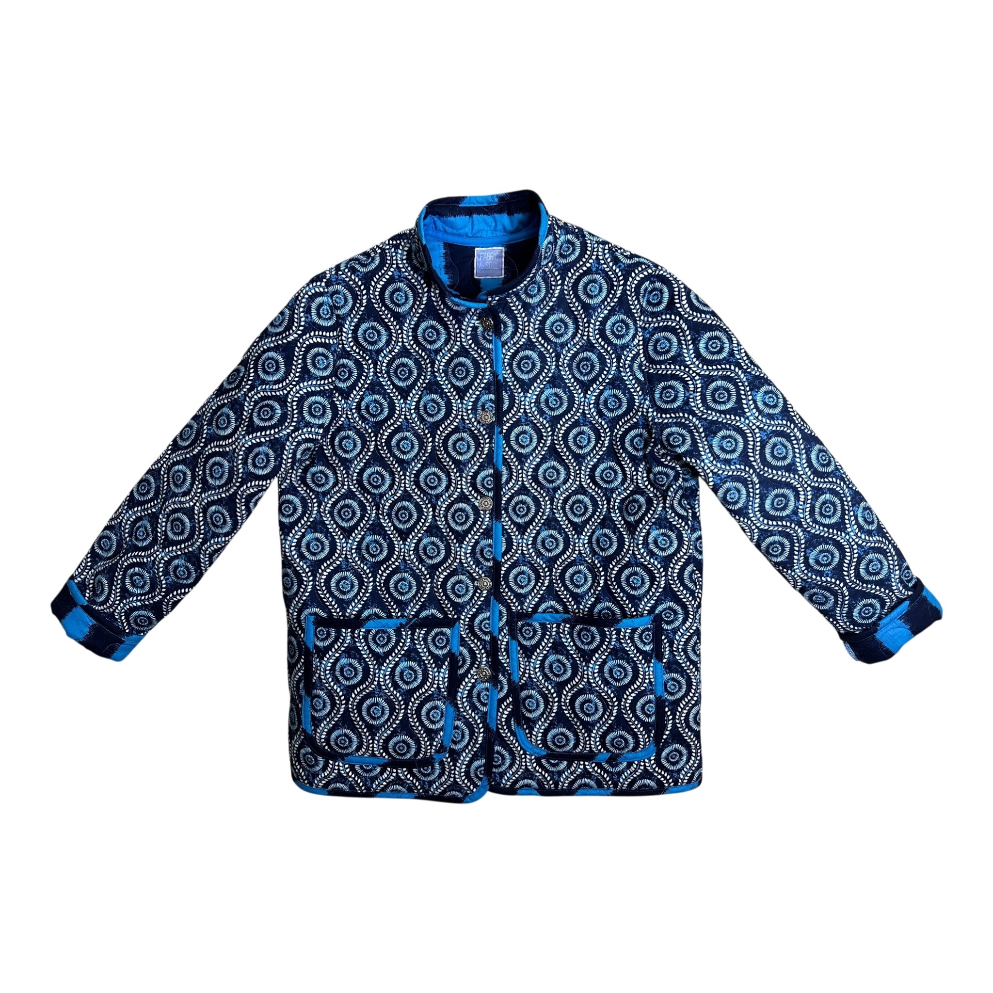 Handmade coastal blue quilted jacket laid flat, full length view, Fabric & Soul
