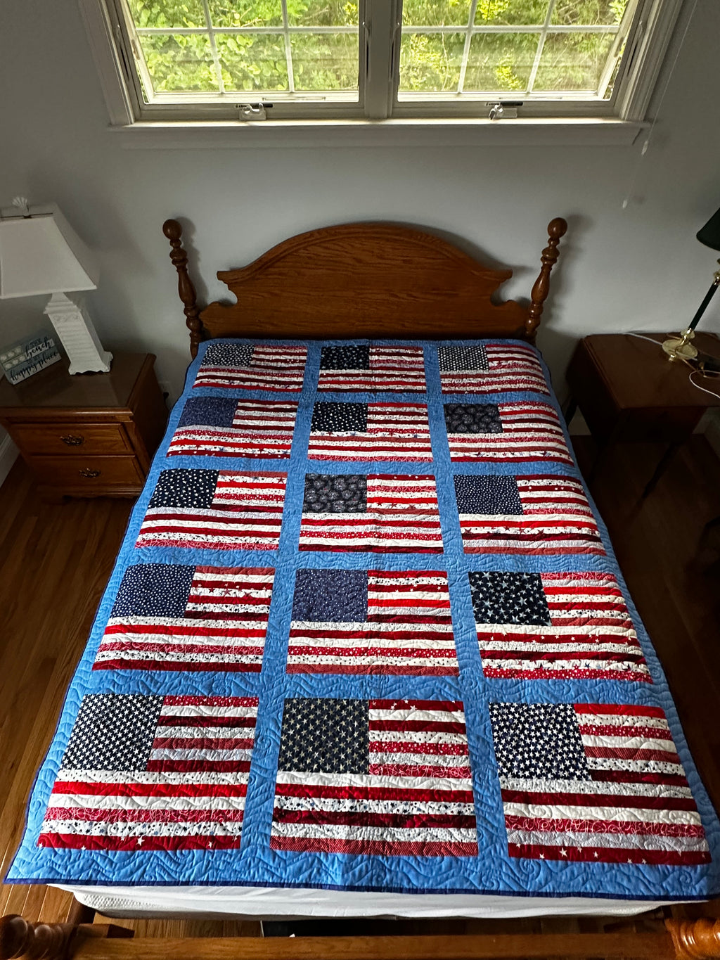 Full quilt overview with flag blocks, colors, size, and origin