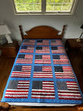 Full quilt overview with flag blocks, colors, size, and origin