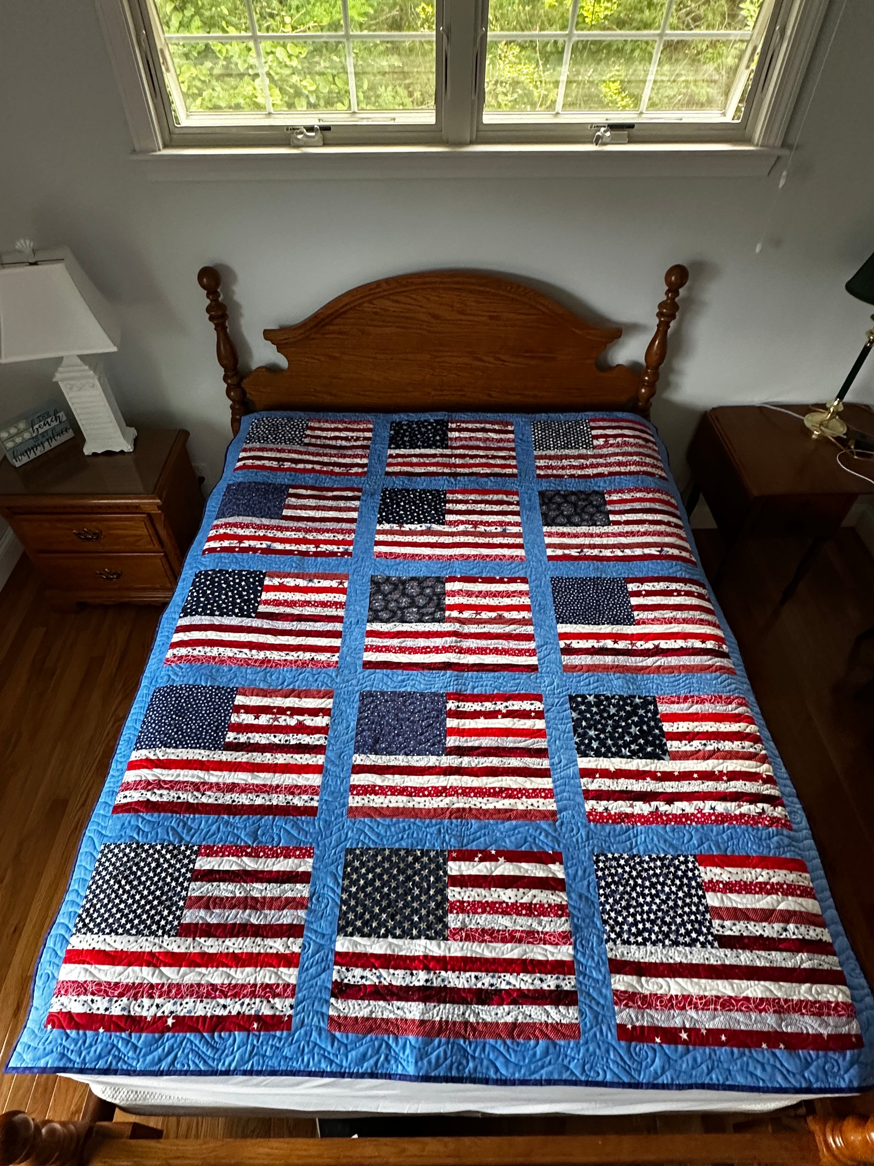 Full quilt overview with flag blocks, colors, size, and origin