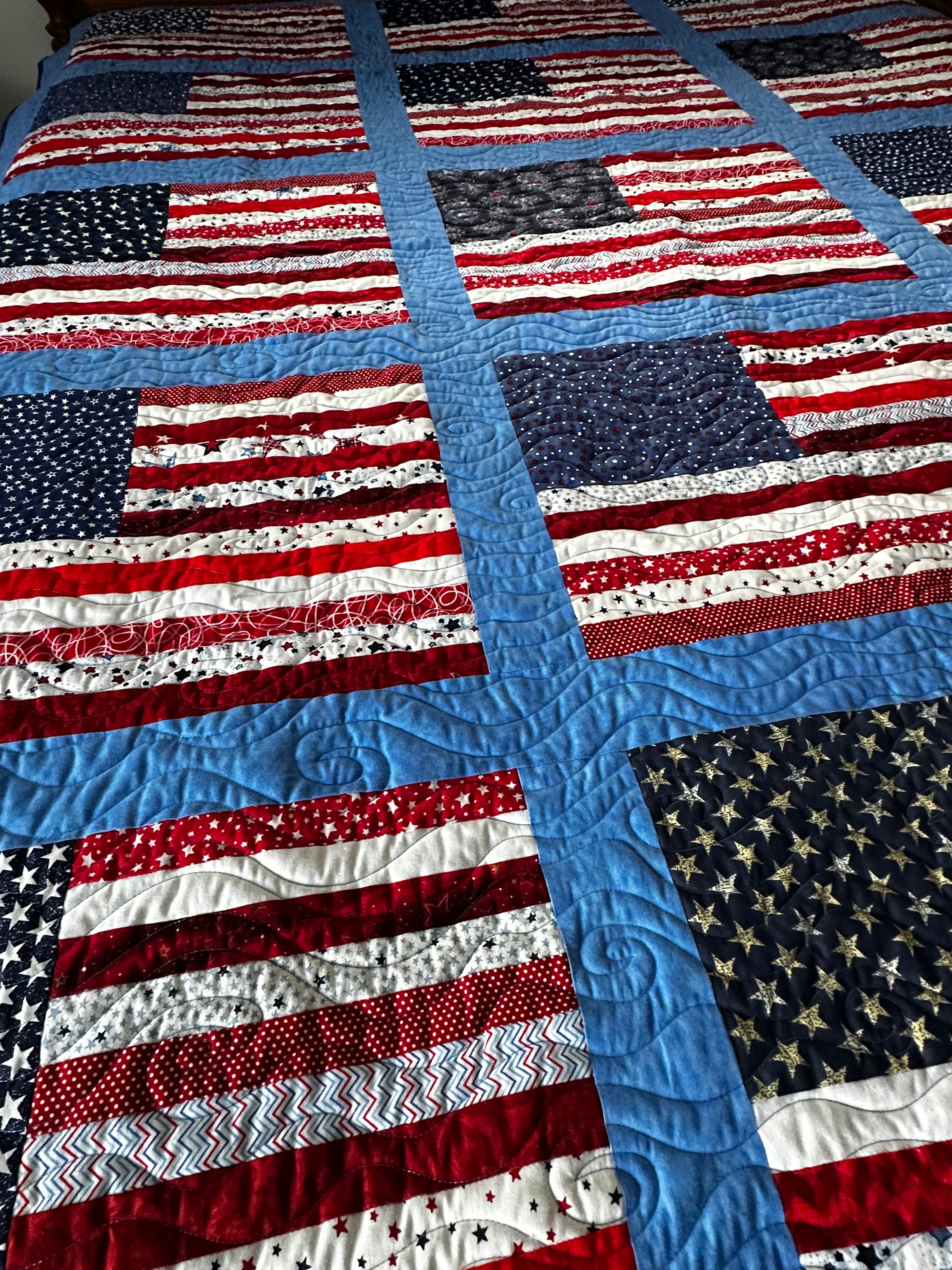 Quilting detail with American flag pattern featuring red, white, and blue colors