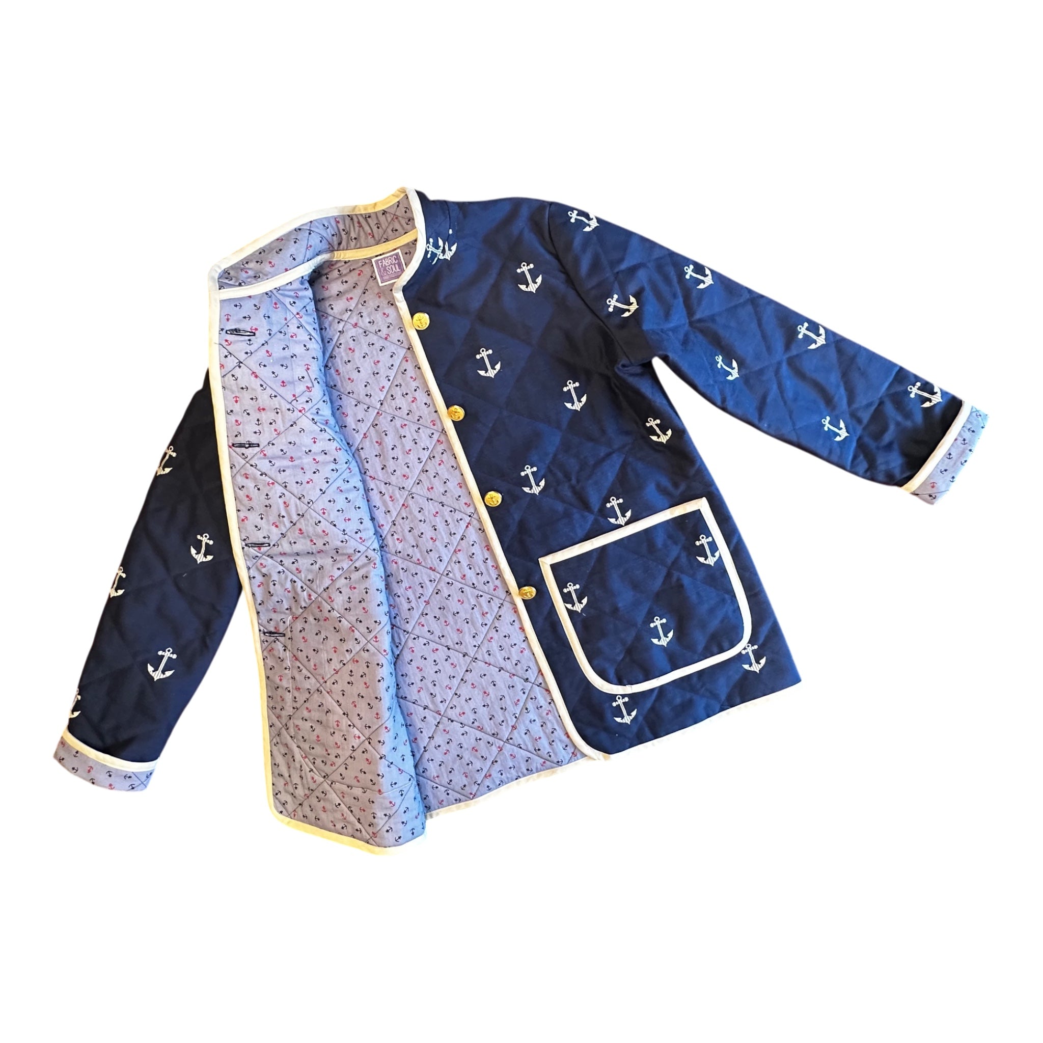 Harbor Heritage Quilted Coat open view showing Egyptian cotton anchor-print lining made in Ohio, USA. Handmade by Fabric & Soul in Cotuit, Cape Cod.
