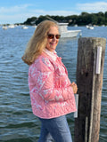 Woman wearing The Chatham Quilt Coat outdoors by the water — Fabric & Soul Signature Collection, upcycled vintage estate sale quilt, Women’s Medium/14