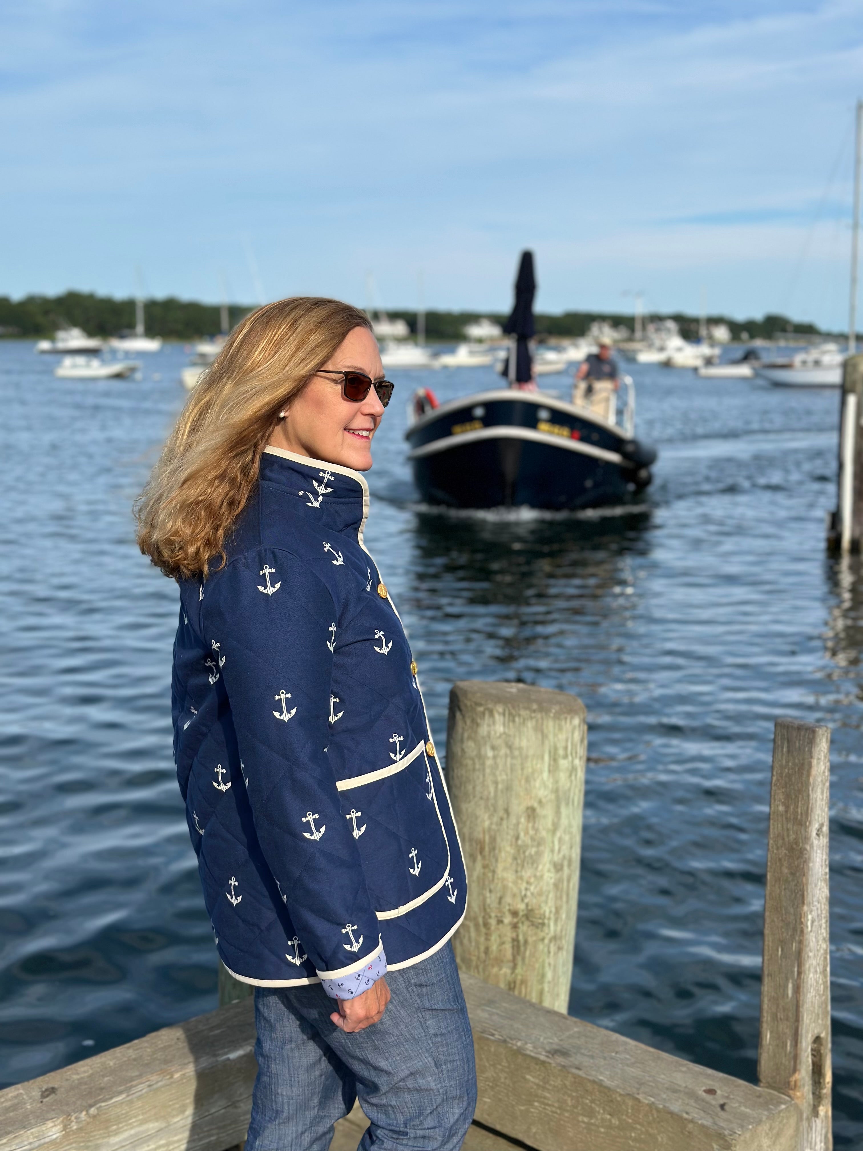 Harbor Heritage Quilted Coat side view showing Egyptian cotton anchor-print lining with rolled up sleeve. Handmade by Fabric & Soul in Cotuit, Cape Cod.