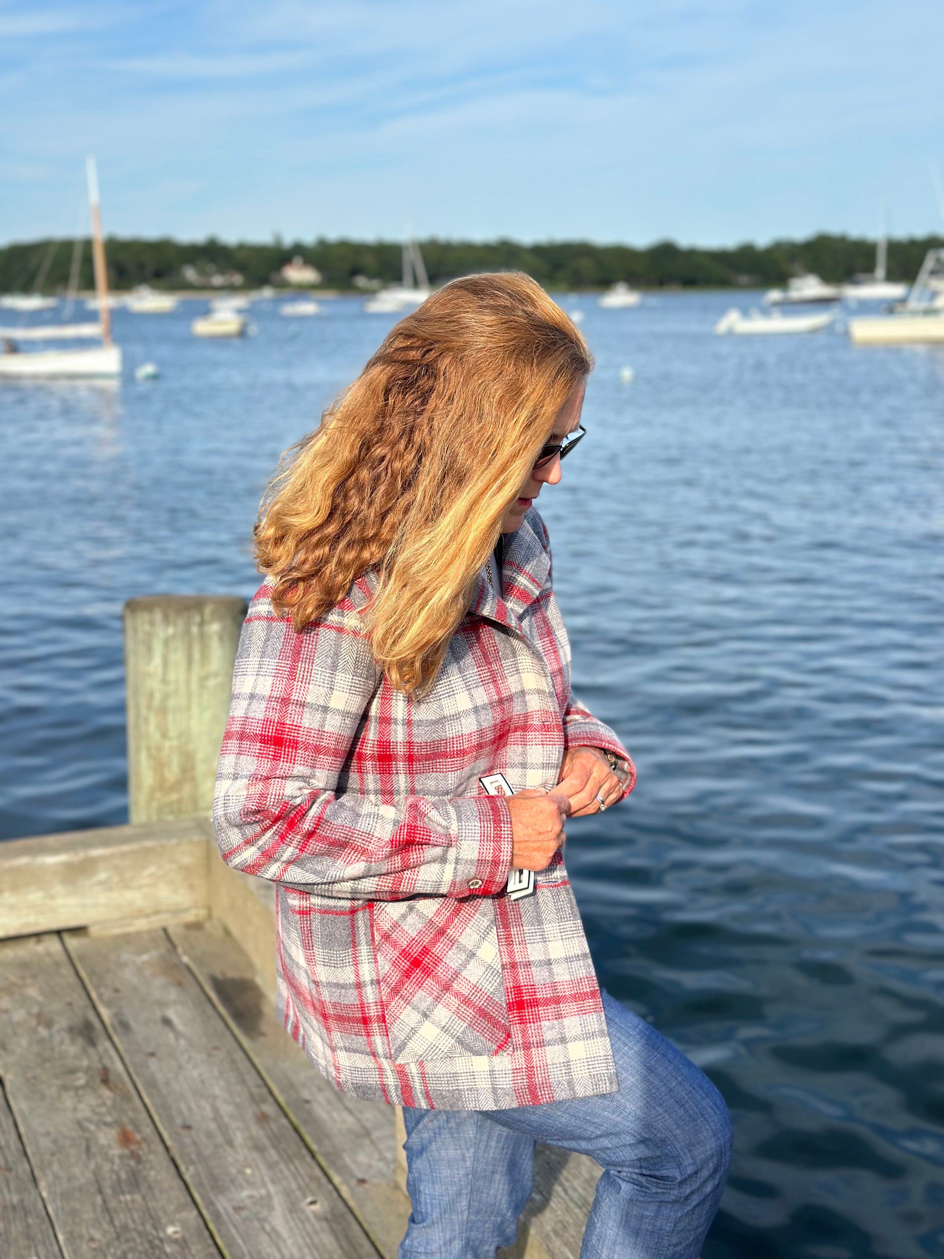 Heritage Oregon Wool Shirt Jacket front view with hands in pockets, smiling on Cotuit Harbor dock. Handmade by Fabric & Soul in Cotuit, Cape Cod.