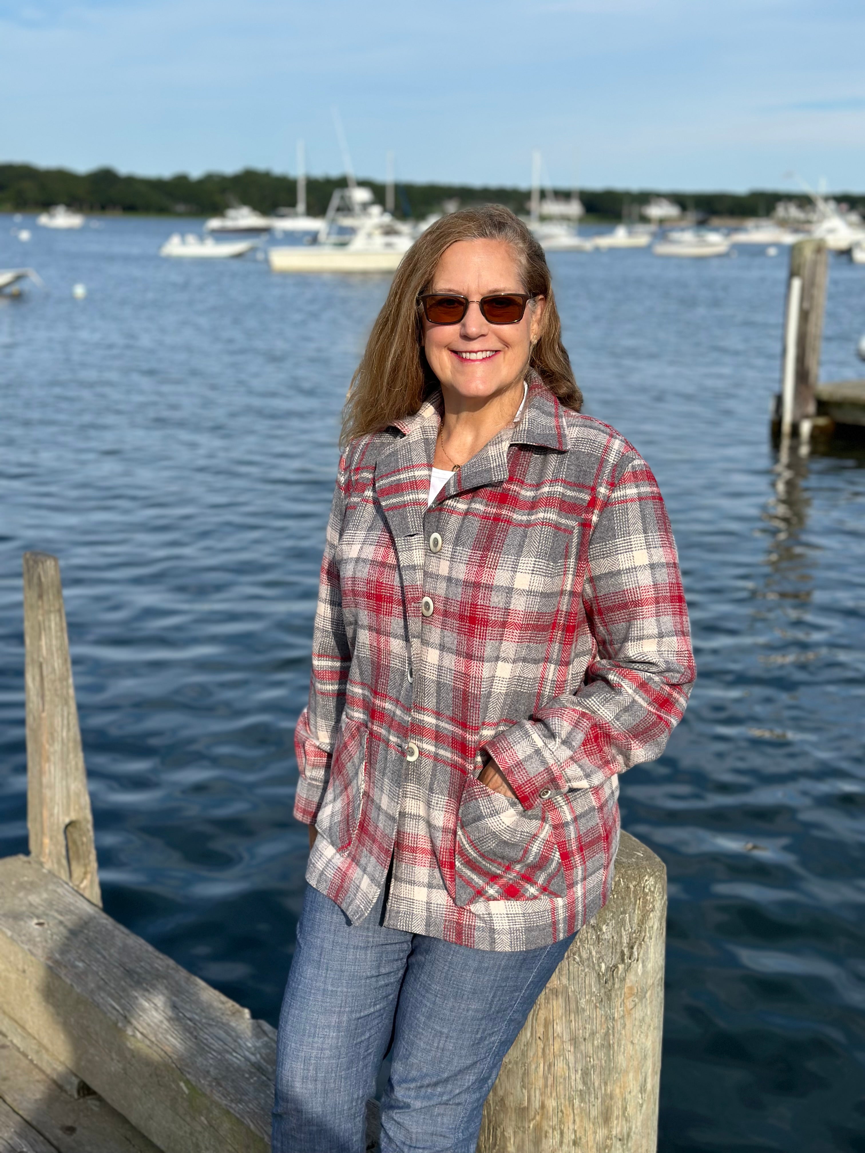 Heritage Oregon Wool Shirt Jacket front view with white boat in background at Cotuit Harbor. Handmade by Fabric & Soul in Cotuit, Cape Cod.