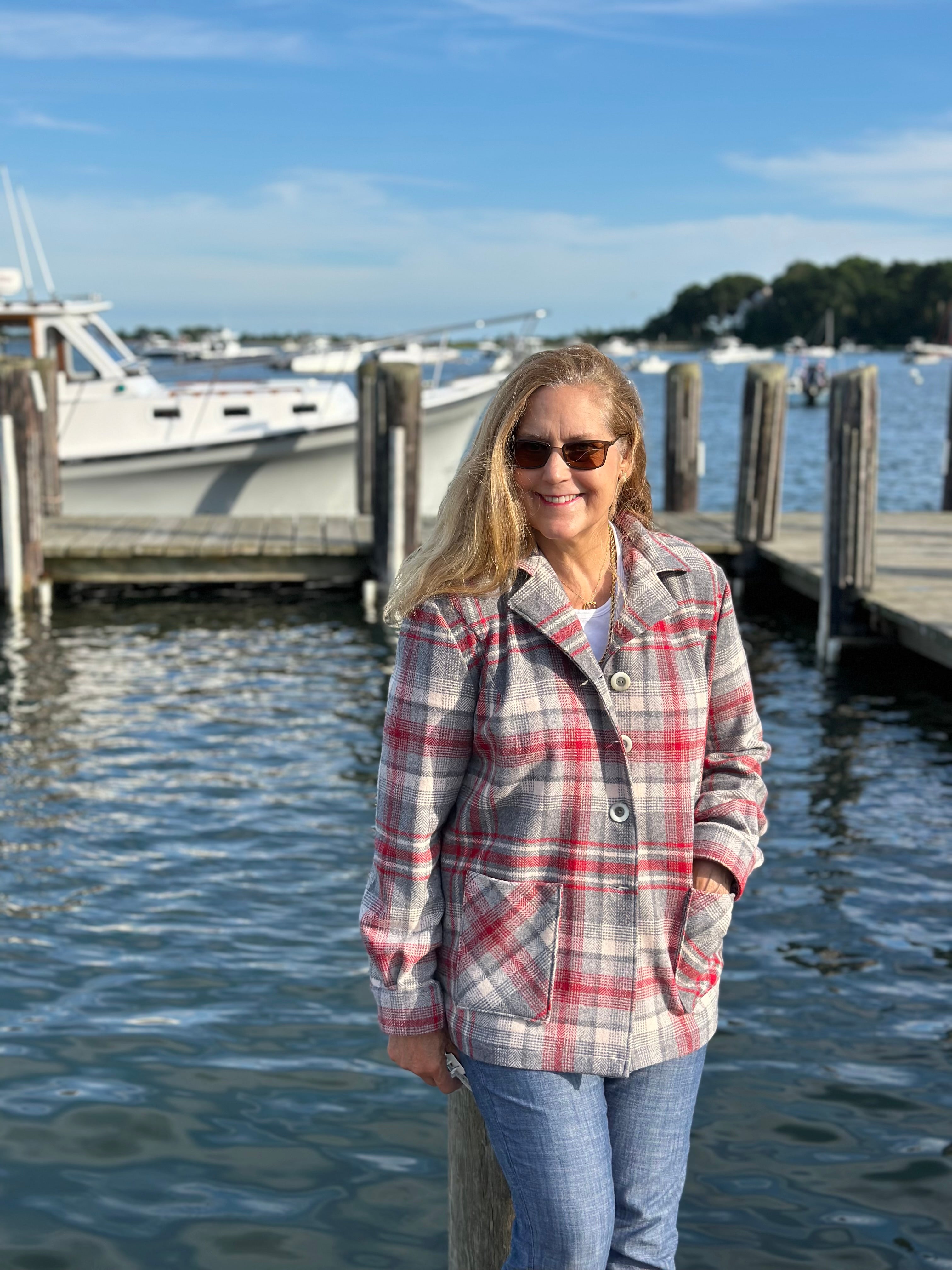 Heritage Oregon Wool Shirt Jacket three-quarter view with Cotuit Launch boat in background. Handmade by Fabric & Soul in Cotuit, Cape Cod.