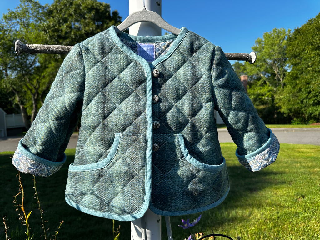 Scottish Wool Quilted Jacket Liberty of London Lined Toddler Size 3T – front view on hanger outdoors