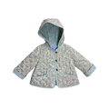 Child wearing designer quilted jacket with paisley pattern