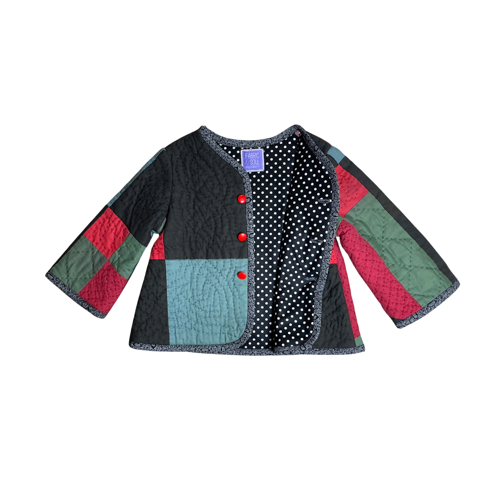 Front detail of hand-quilting  showing new black & white polka dot lining