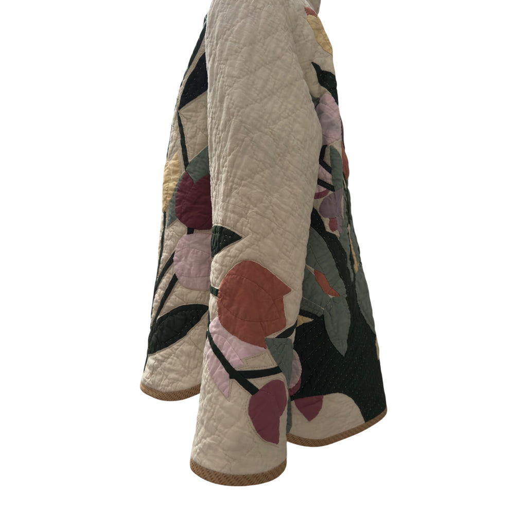 Floral quilt sleeve detail  from side showing appliqué details handmade by Fabric & Soul