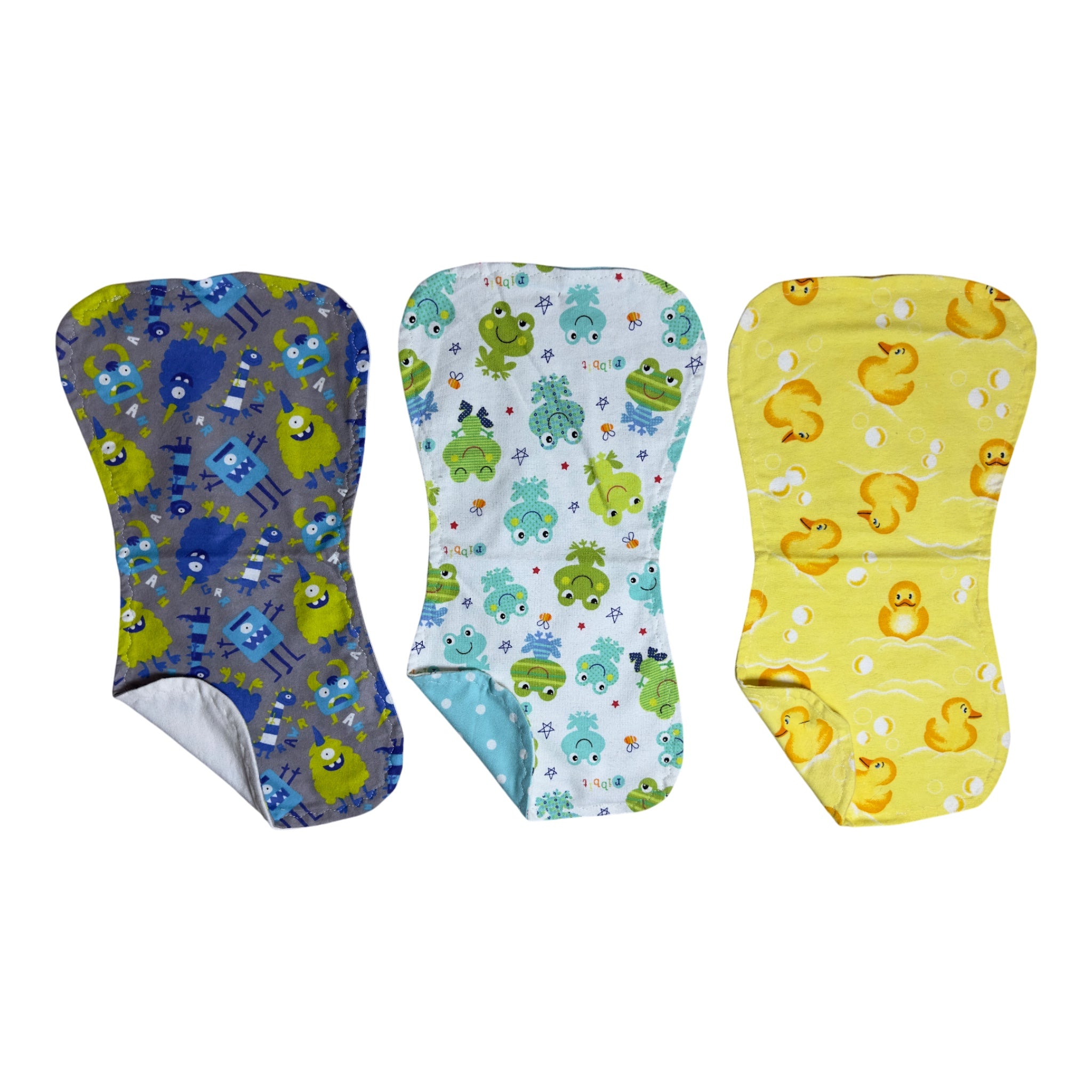 Handmade flannel baby burp cloth set of three with yellow rubber ducks, monsters, and frogs backed in blue polka dots