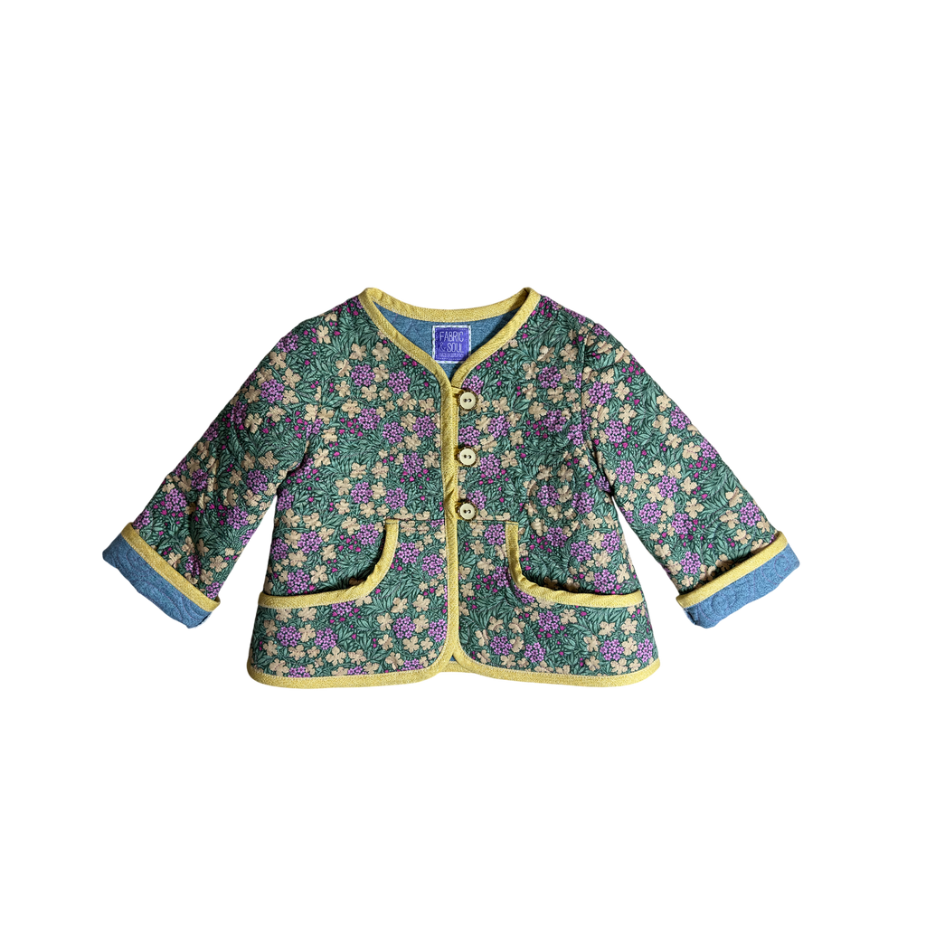 Childs Woodland Bloom jacket with green,  pink and blue botanical print