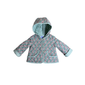 Child wearing teal paisley hooded coat with quilted wool lining