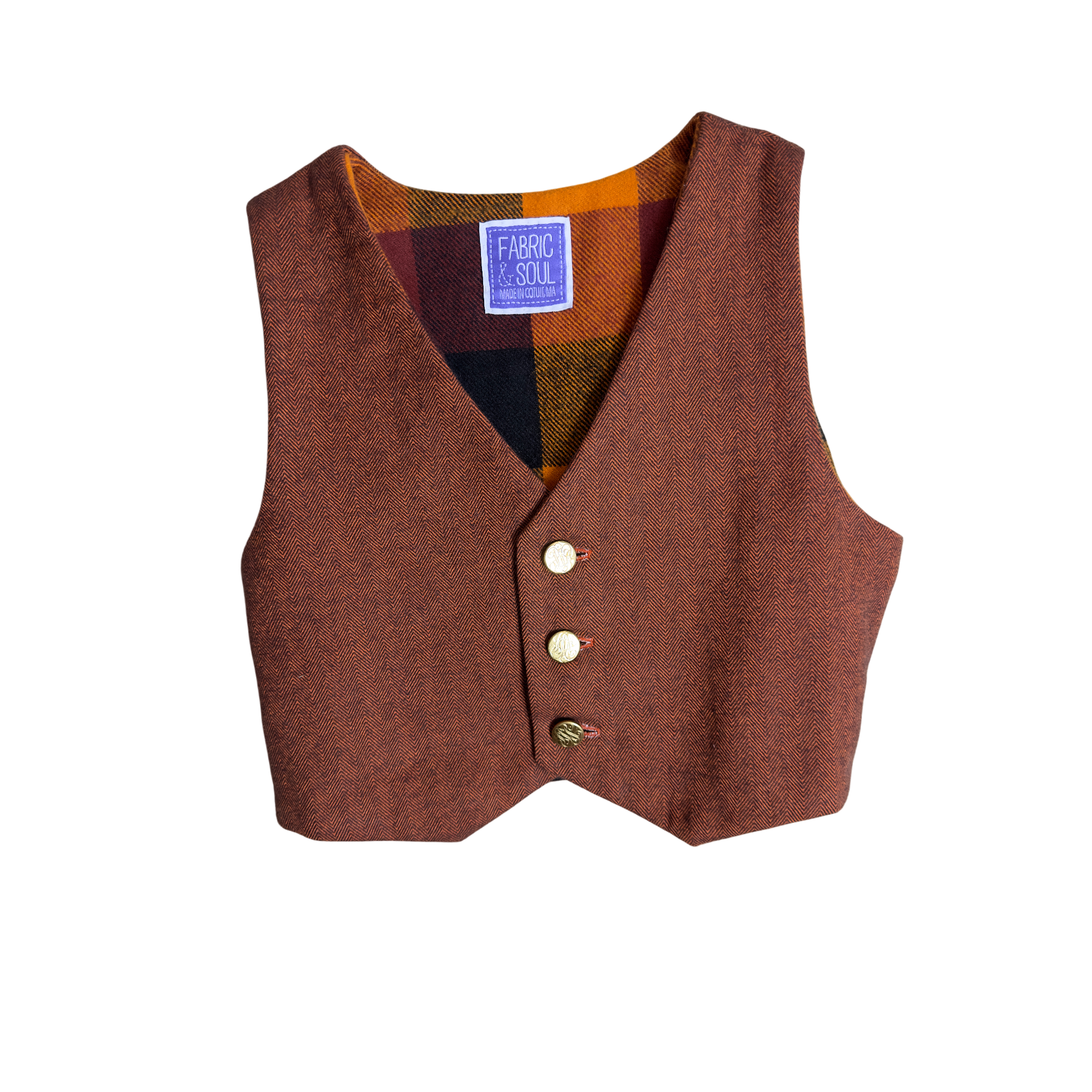 Heritage Rust vest with vintage gold buttons showing flannel block lining