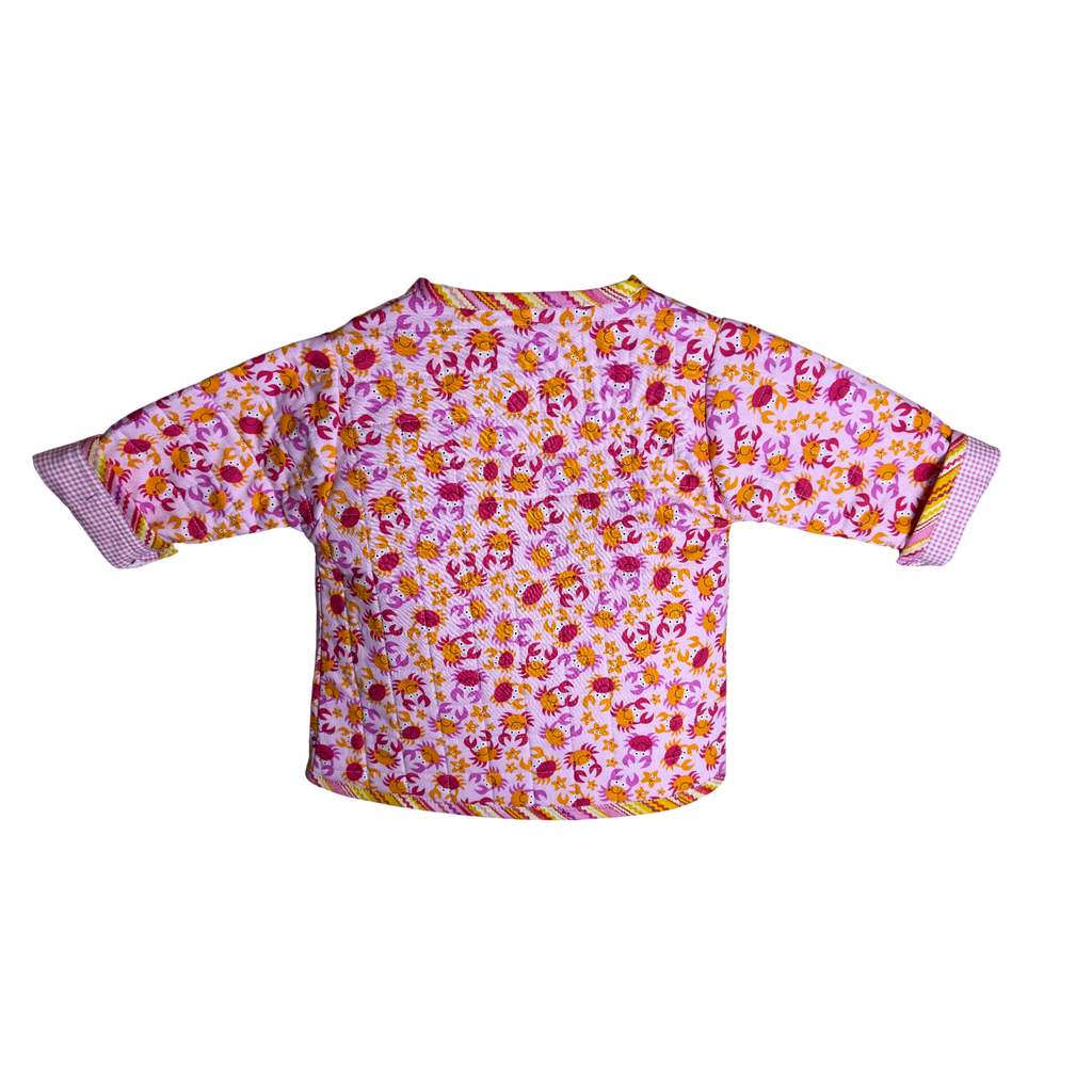 Back view of wrap and snap toddler coat in pink