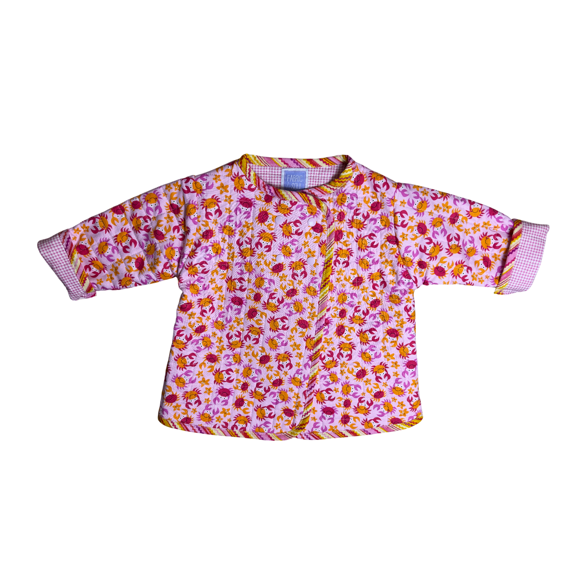 Pink quilted coat with crabs and starfish print 