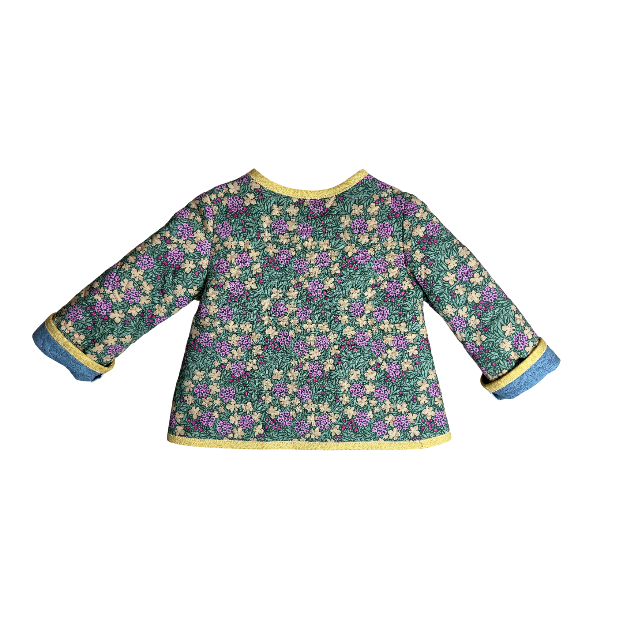 Back view of handmade quilted floral coat for kids