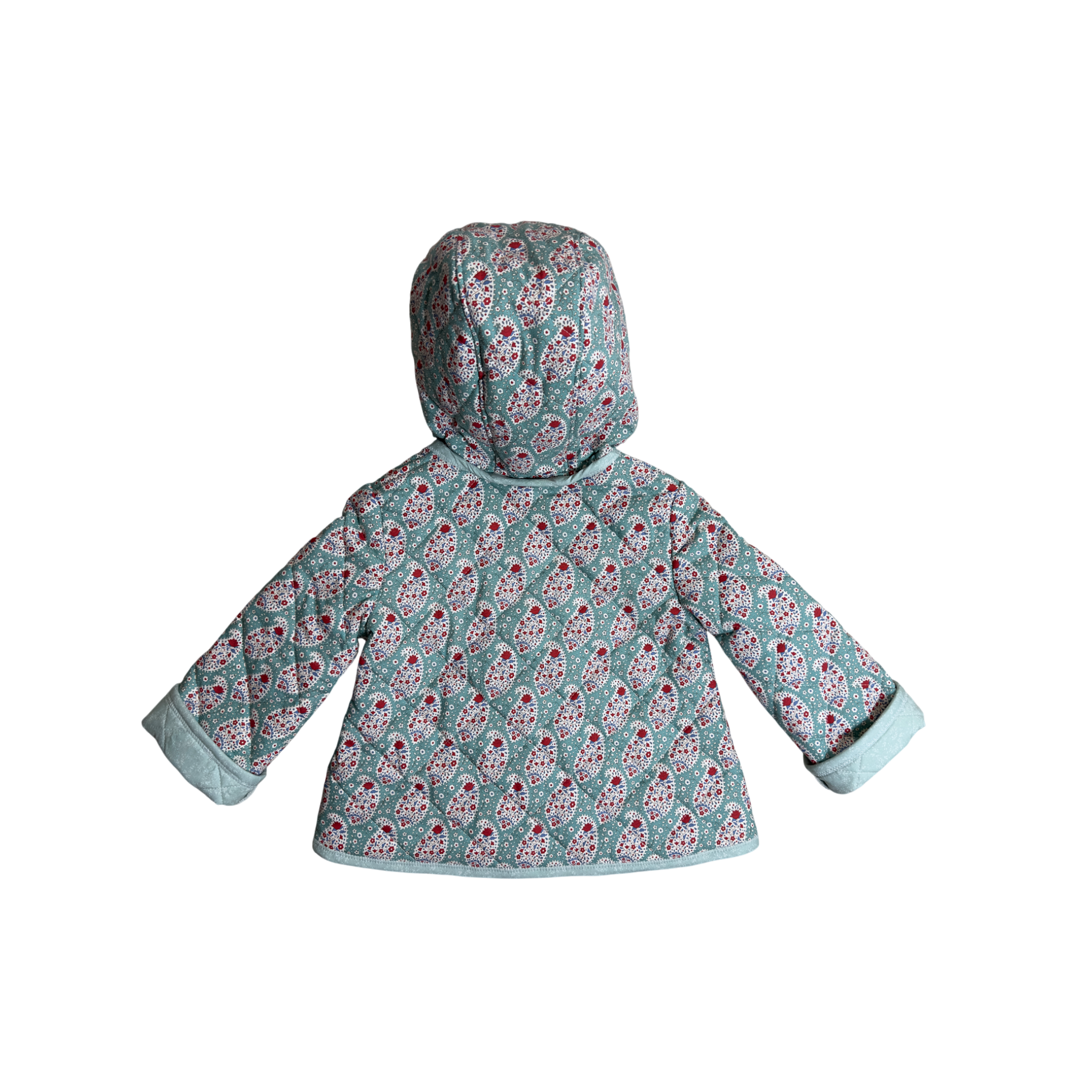 Back view of hooded coat showing paisley pattern and quilting